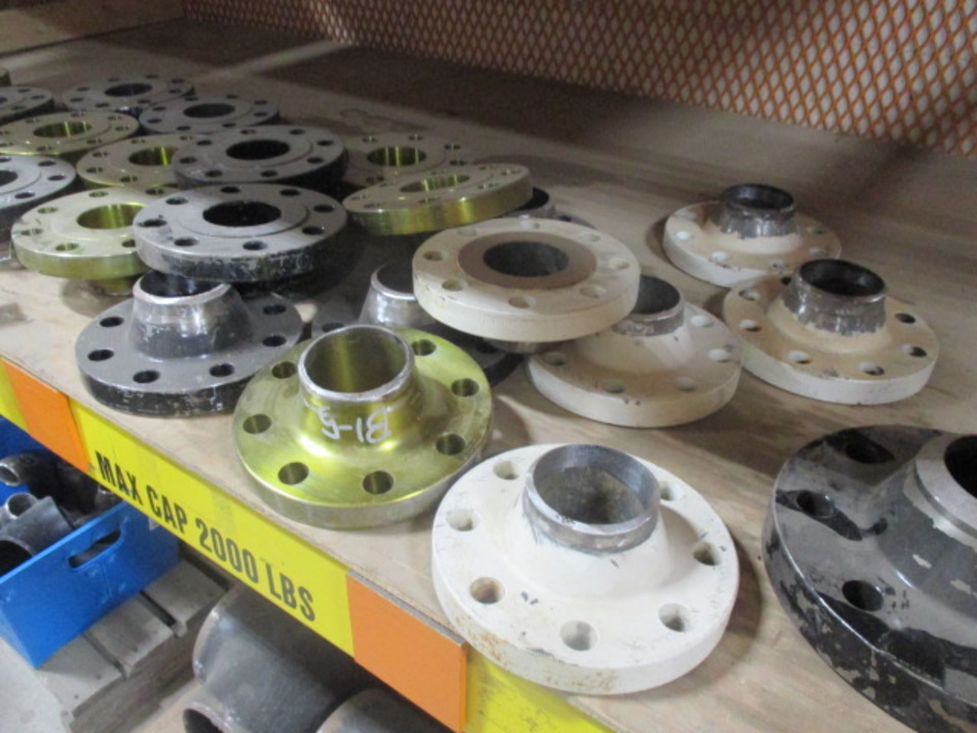 Shelf Lot of Pipe Flanges Various Sizes