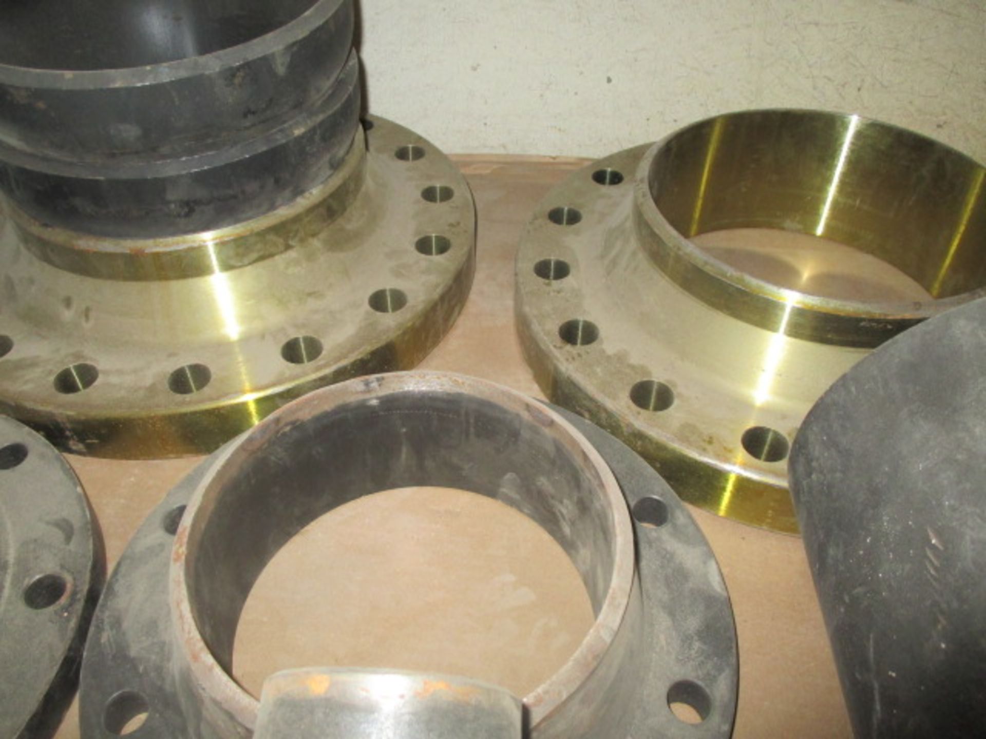 Skid lot of Various Pipe "Ts" and End Flanges 8"
