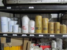 First Shelf of Misc. - Filters, Coolant, Lube, Assorted Filters, Coolant/Fuel/Lube, Cat, Fleetguard,