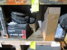 Shelf of Miscellaenous Truck Parts & Adhesive