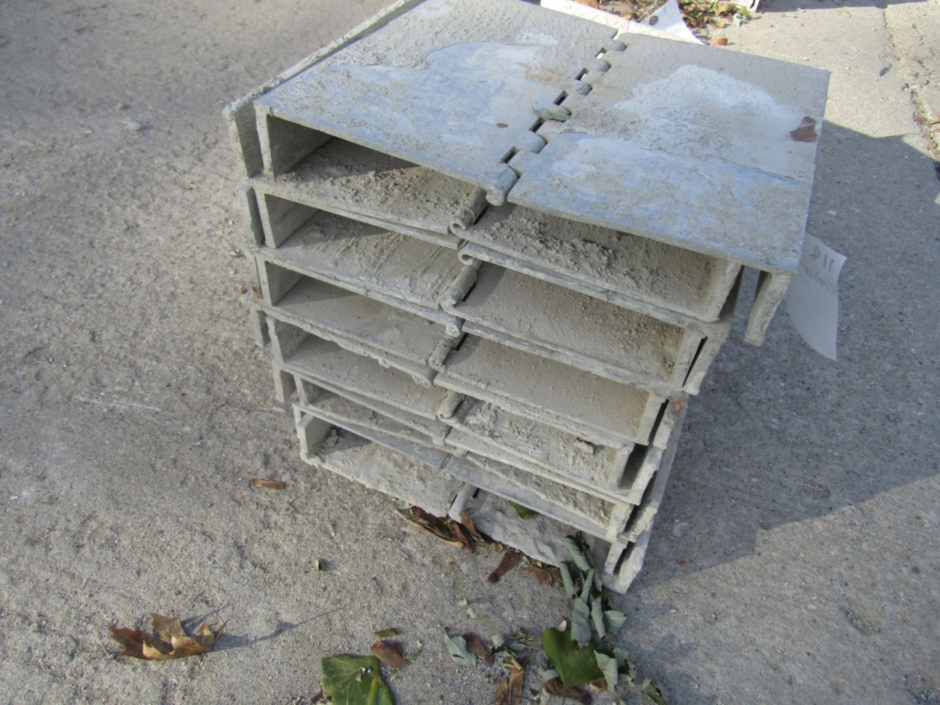 (12) 13" x 2" x 1'Durand Cap Concrete Forms Hinged, Smooth 6-12 Hole Pattern, Located in Mt.