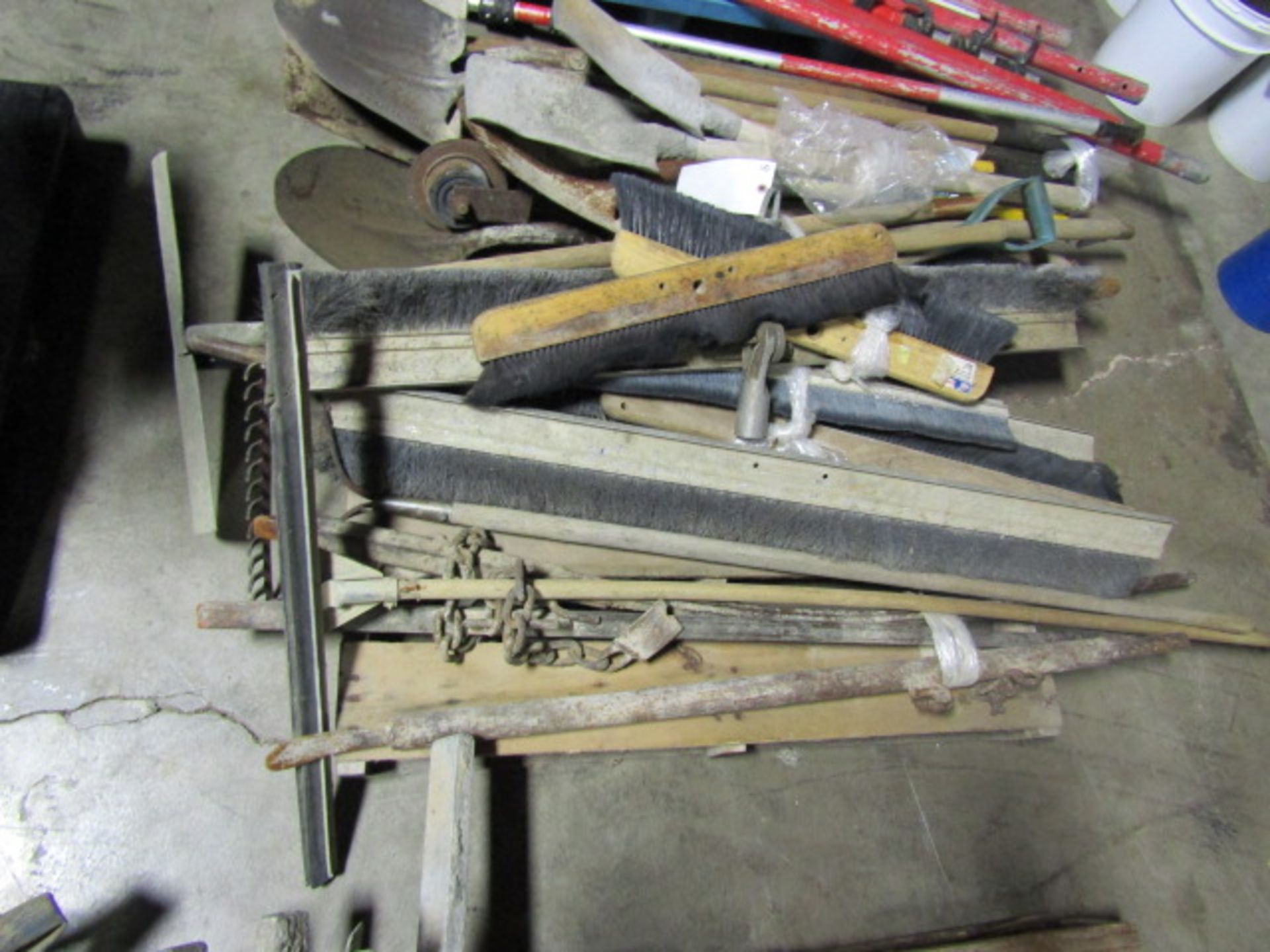 Pallet of Shovels, Rack, Squeege, Handles, Broom Heads, etc. Located in Mt. Pleasant, IA