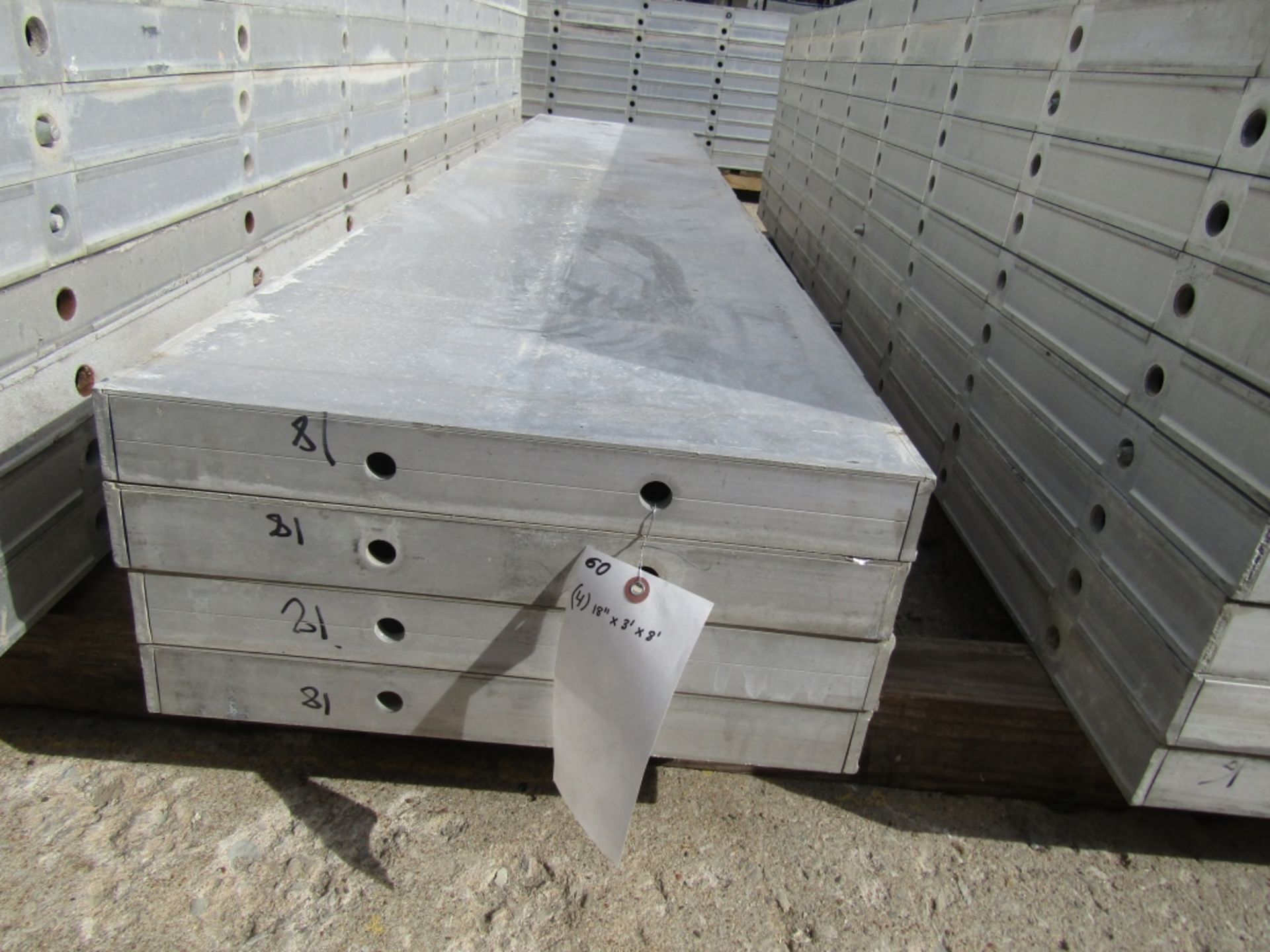 (4) 18" x 8' New Durand Concrete Forms, Smooth 6-12 Hole Pattern, Attached Hardware, Located in