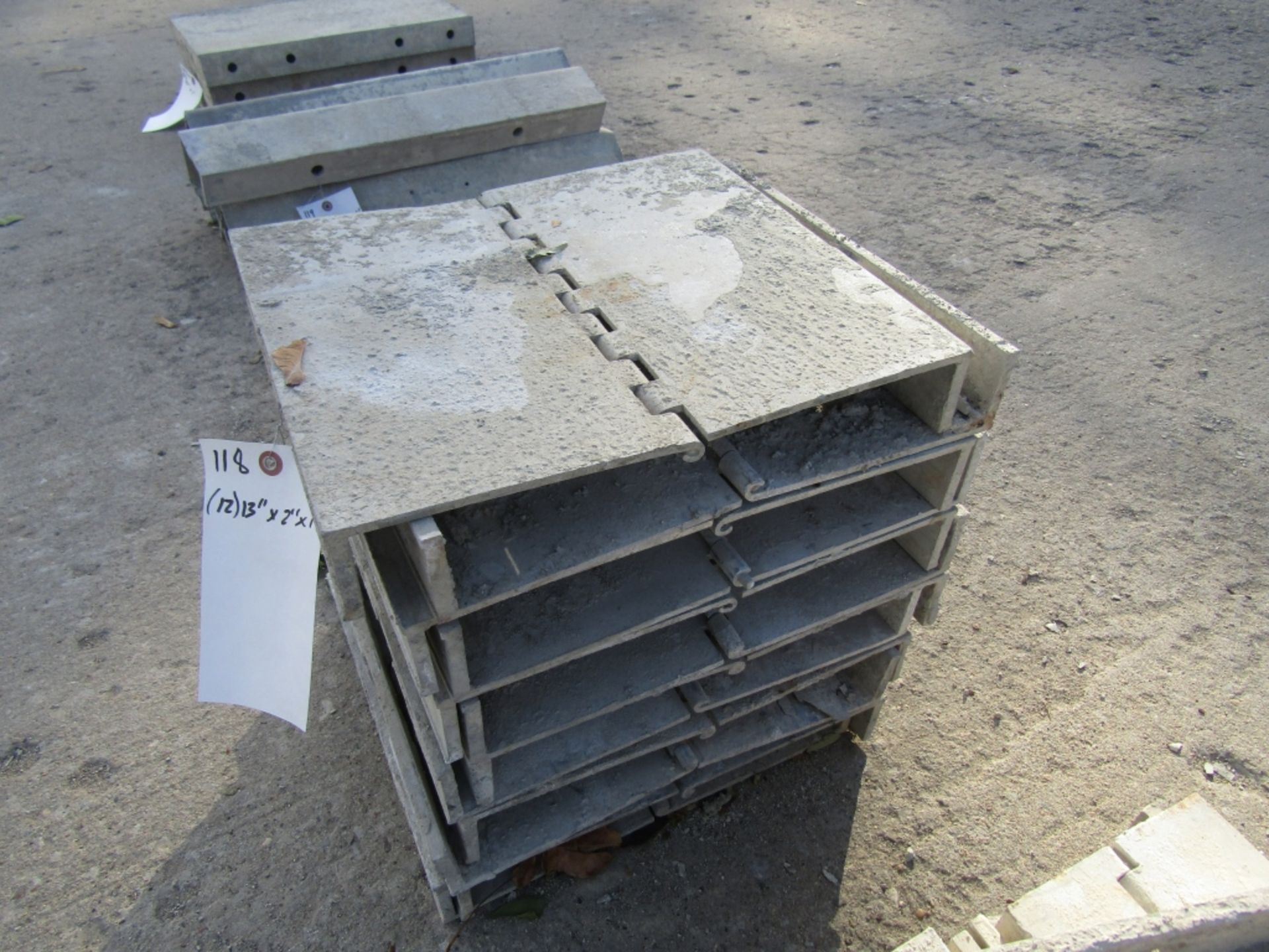 (12) 13" x 2" x 1'Durand Cap Concrete Forms Hinged, Smooth 6-12 Hole Pattern, Located in Mt. - Image 2 of 2