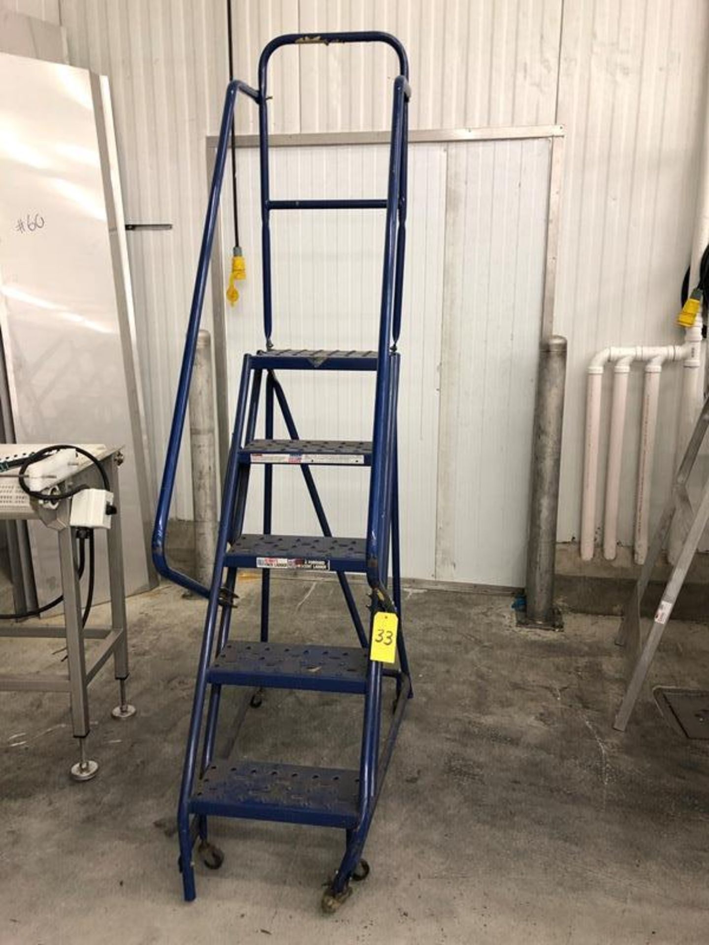 Portable Ladder, Louisville Mfg., 5 steps, on wheels with hand rails (Located in Bridgeview, IL) (