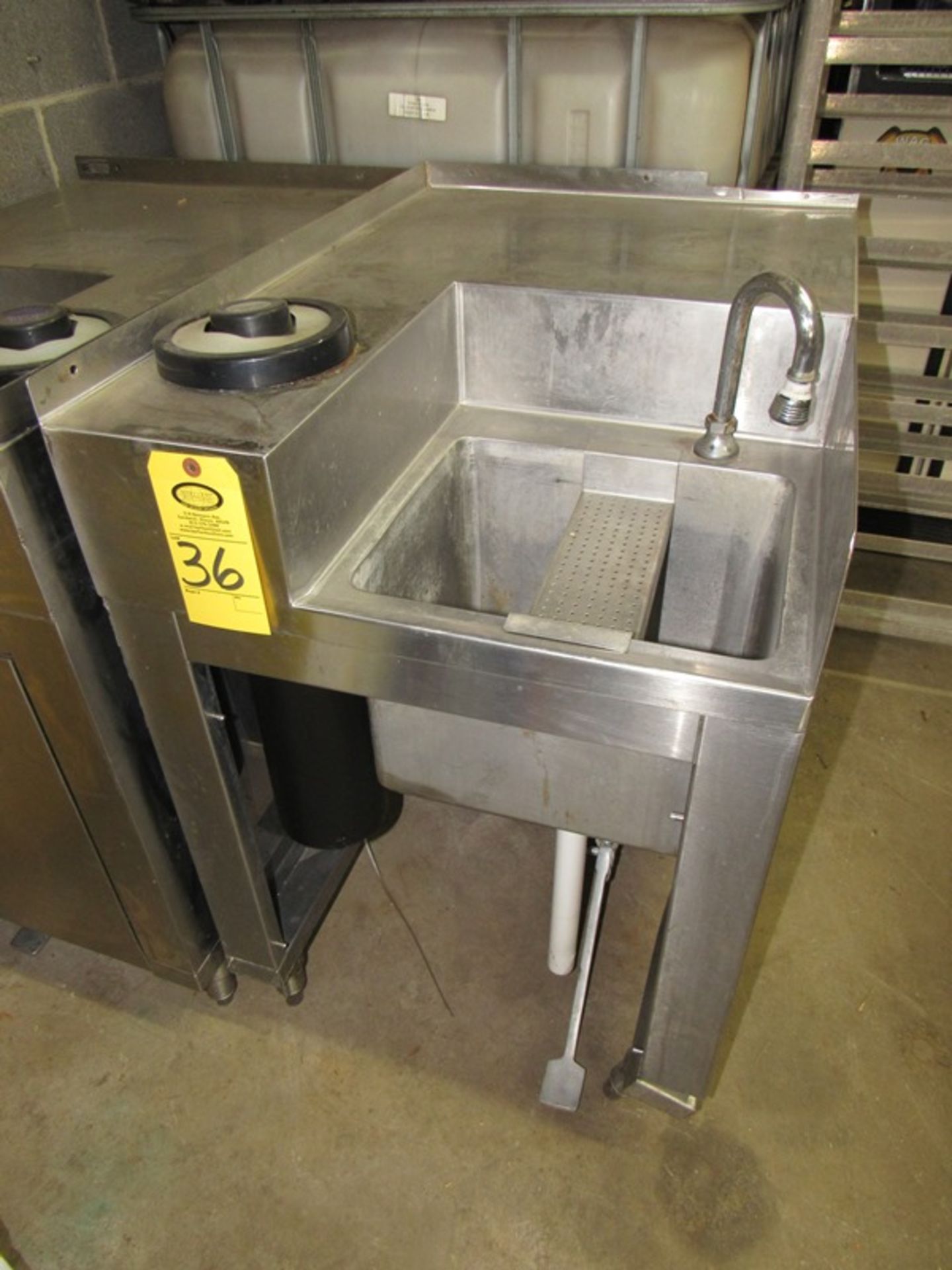 S.S. Sink , 24" W X 34" L cabinet, single faucet, Jan Jamar spring loaded cup holder, foot pedal