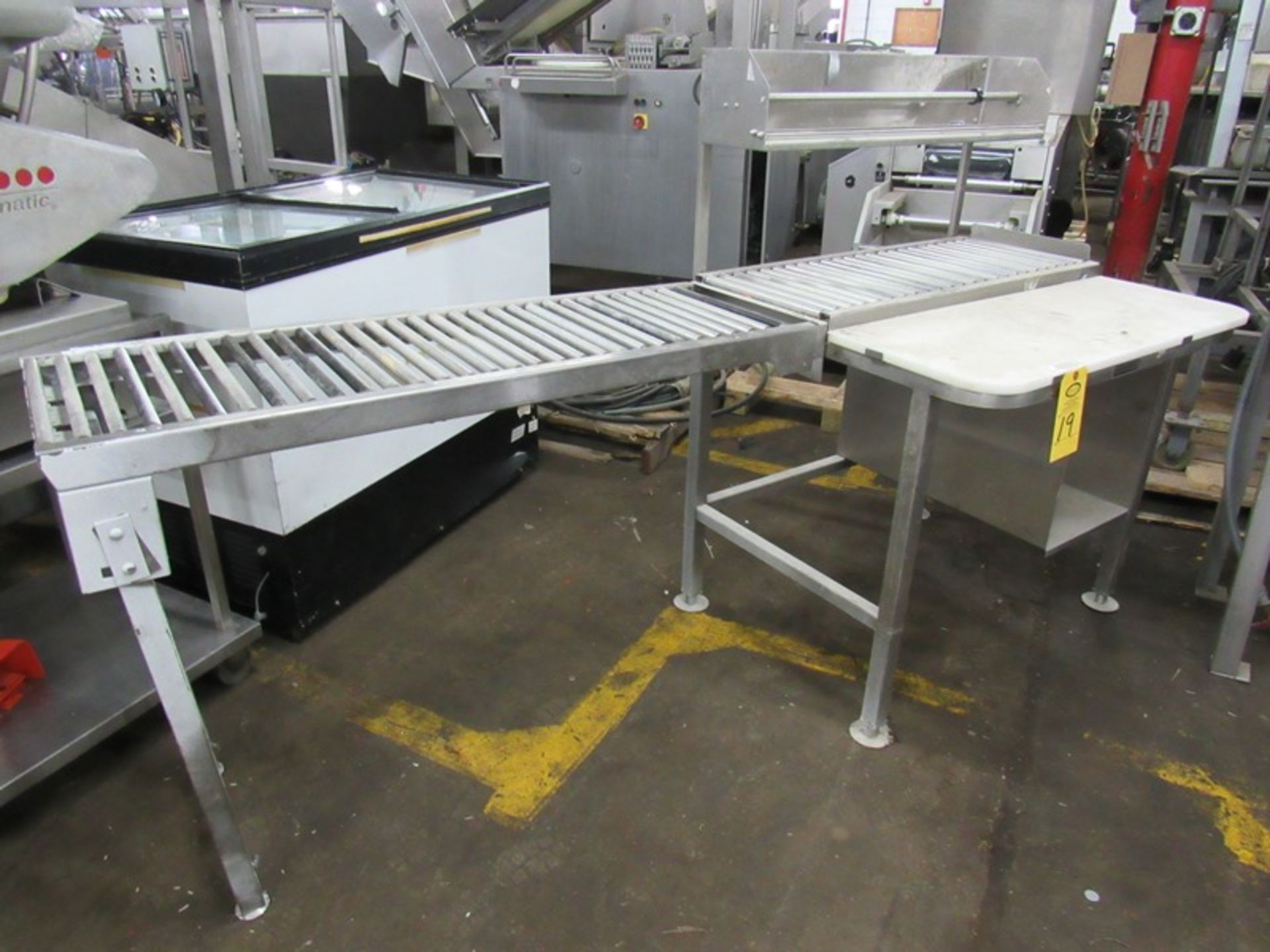 Stainless Steel Table , 30" W X 36" L with 12" wide poly top roller conveyor