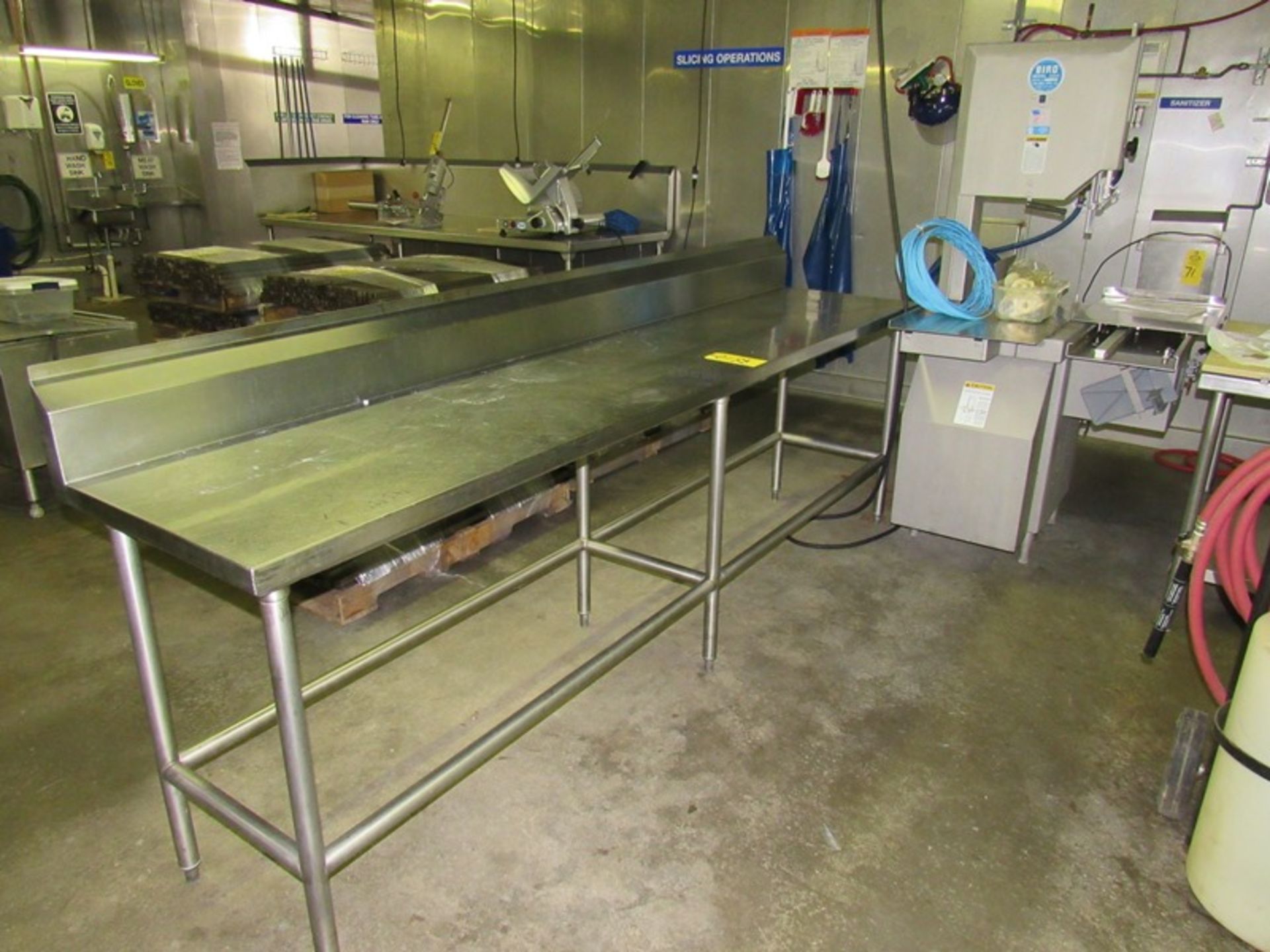 Stainless Steel Table, 22" W X 9' L X 36" T with 8" backsplash (All Funds Must Be Received by Friday