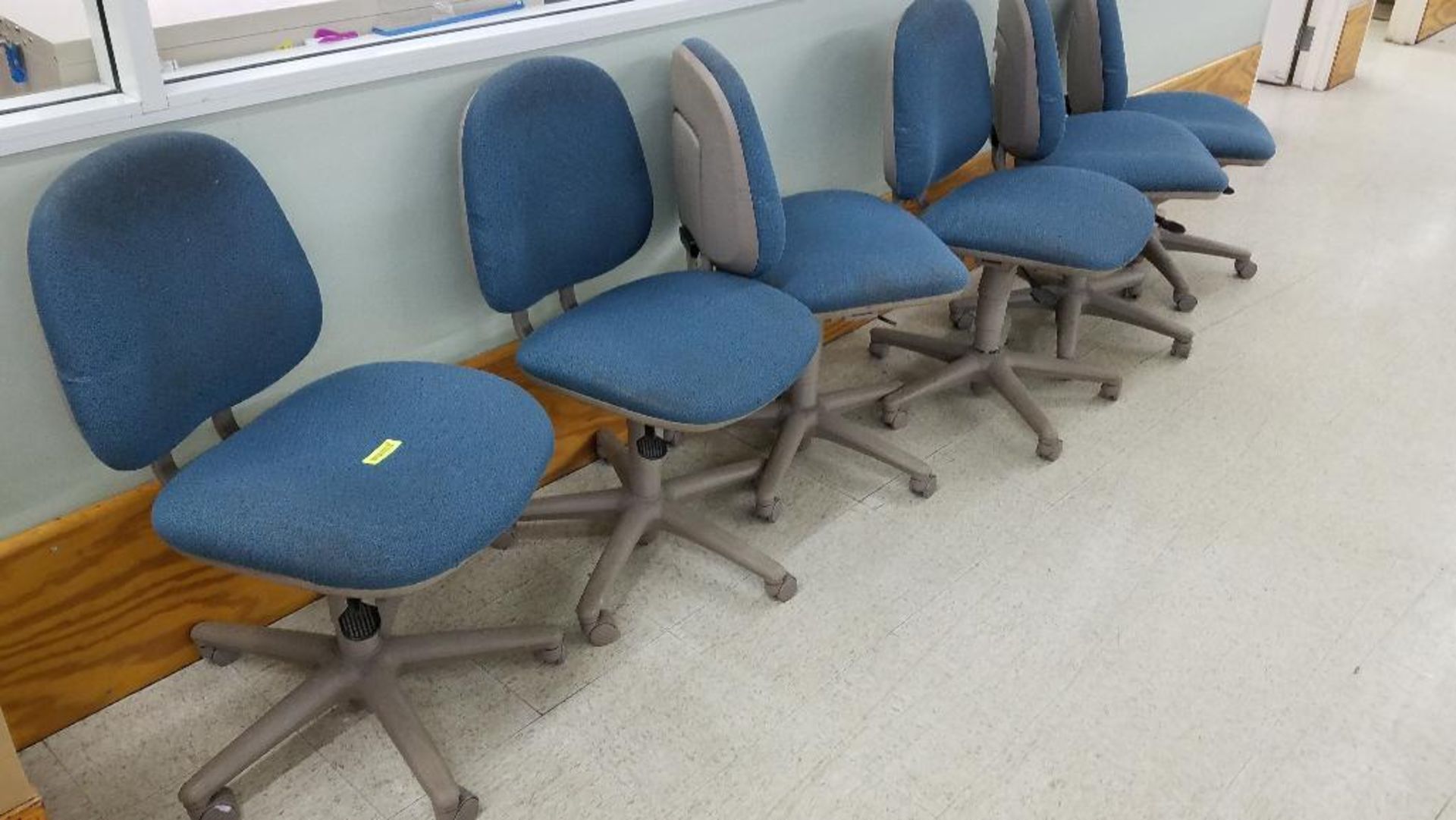 DESCRIPTION: (6) ROLL ABOUT BLUE UPHOLSTERED OFFICE CHAIRS ADDITIONAL INFORMATION: NEED CLEANED LOCA - Image 2 of 3