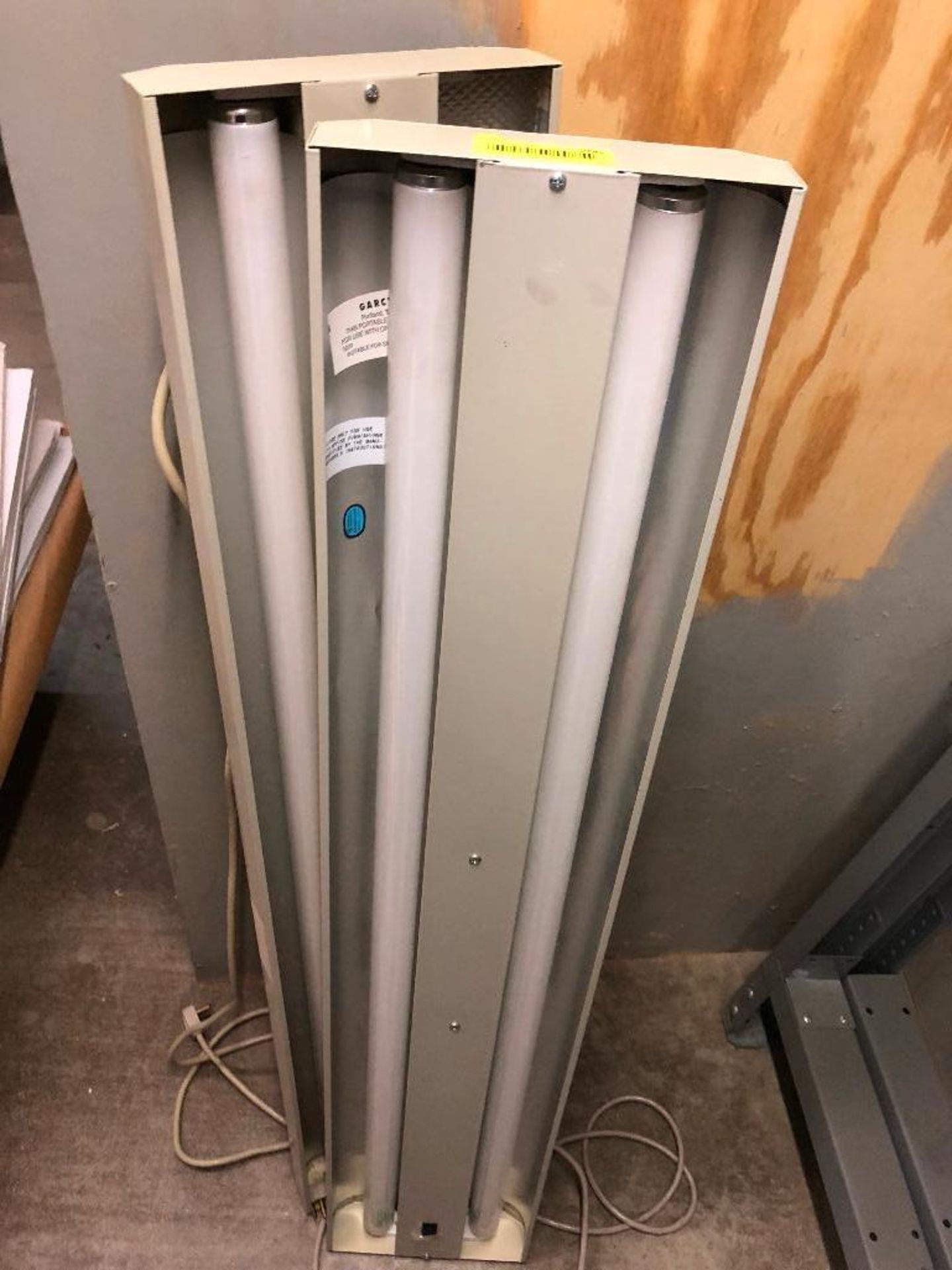 DESCRIPTION: (2) 36 INCH FLUORESCENT LIGHT FIXTURES. LOCATION: WAREHOUSE THIS LOT IS: SOLD BY THE PI