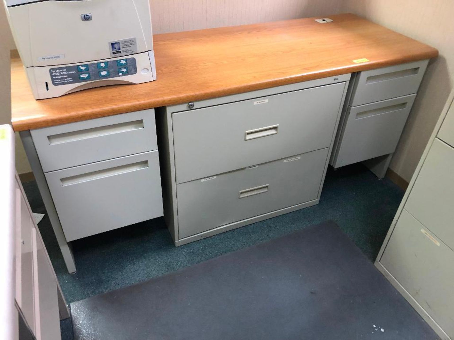DESCRIPTION: 60 INCH METAL WORK STATION W/ LAMINATE WOOD TOP. ADDITIONAL INFORMATION: W/ TWO DRAWER