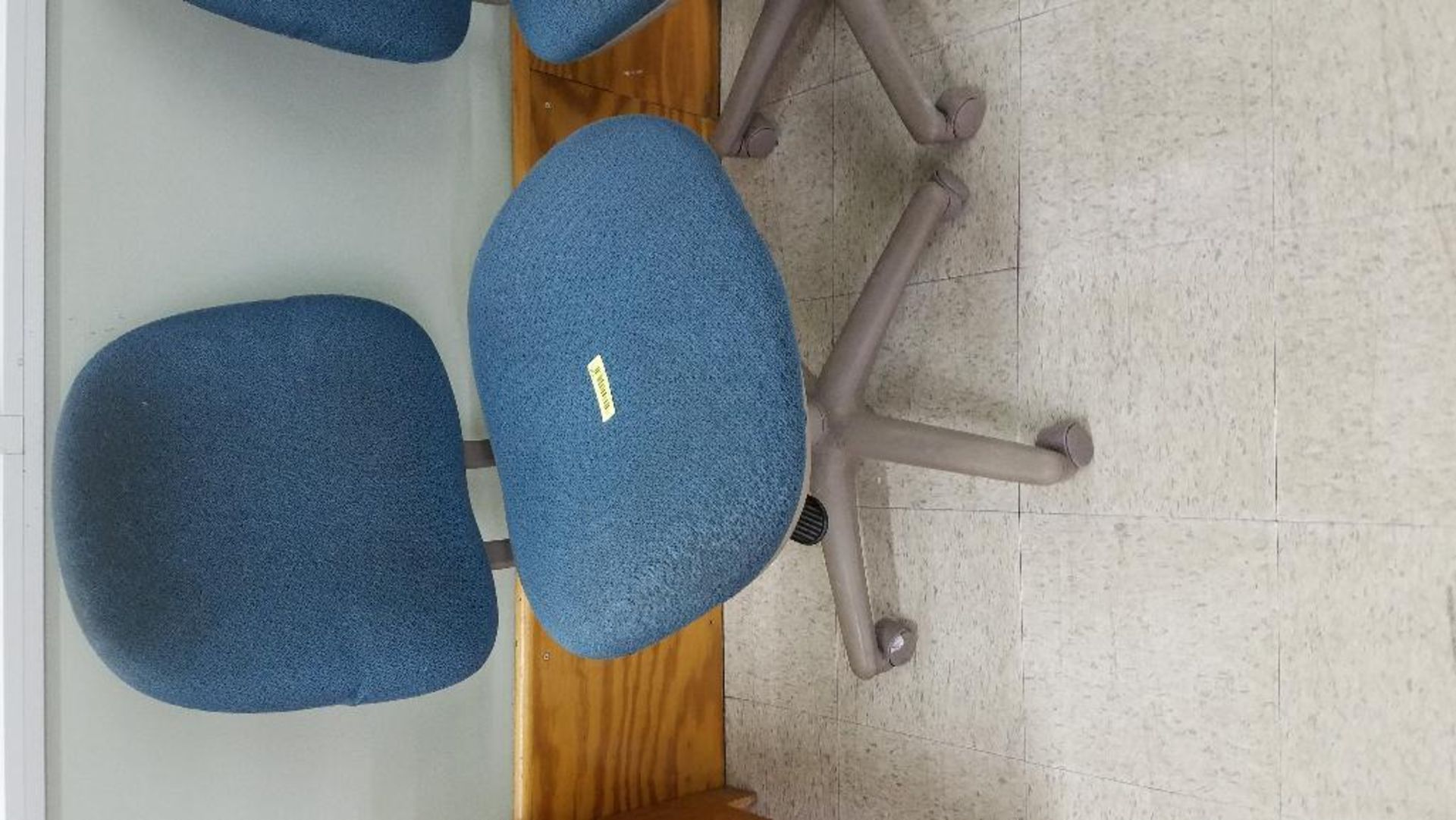 DESCRIPTION: (6) ROLL ABOUT BLUE UPHOLSTERED OFFICE CHAIRS ADDITIONAL INFORMATION: NEED CLEANED LOCA - Image 3 of 3