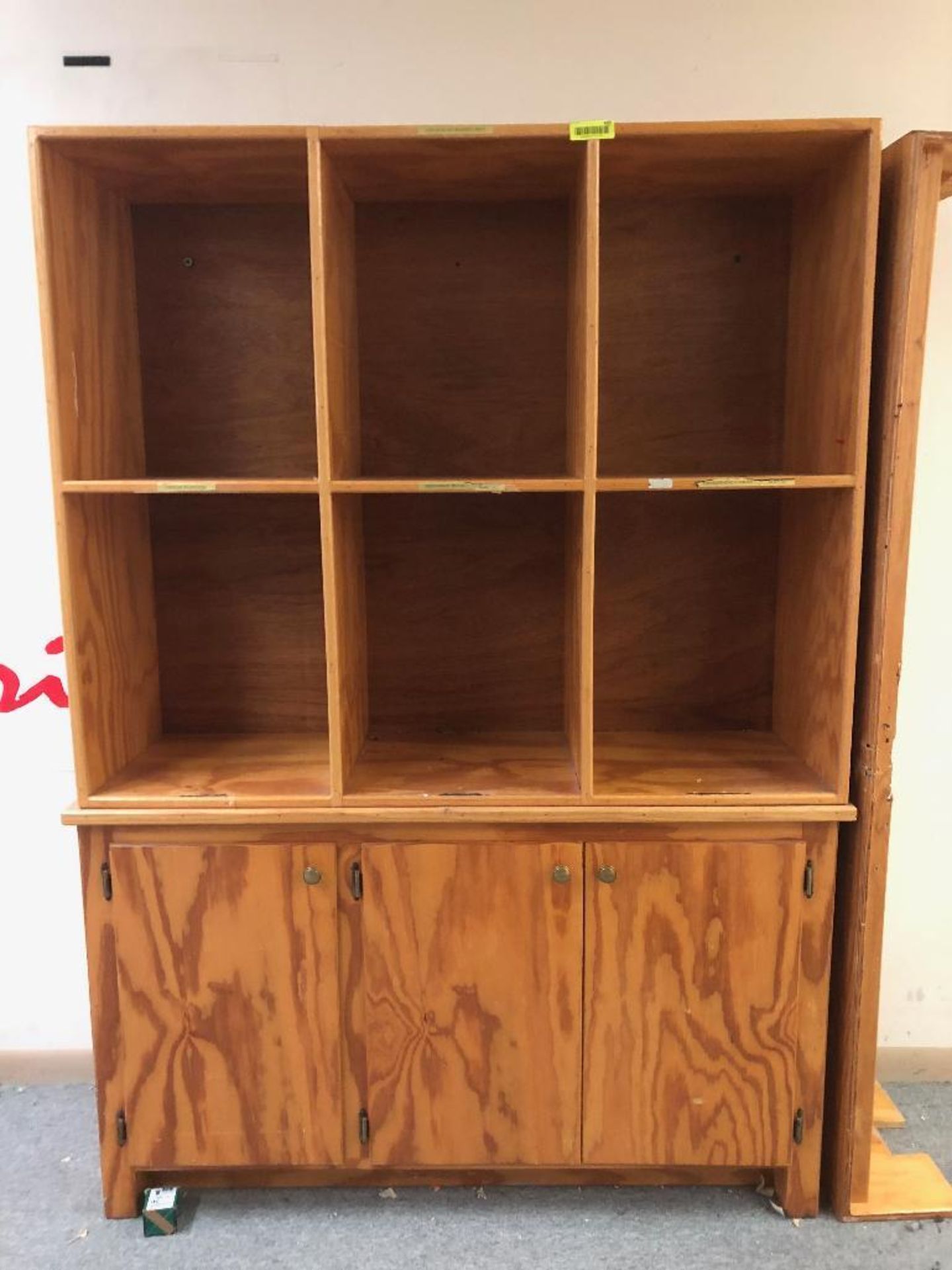 DESCRIPTION: 6-CUBE WOODEN CABINET SIZE: INCHES: 52 X 17 X 72 LOCATION: SHIPPING OFFICE QTY: 1