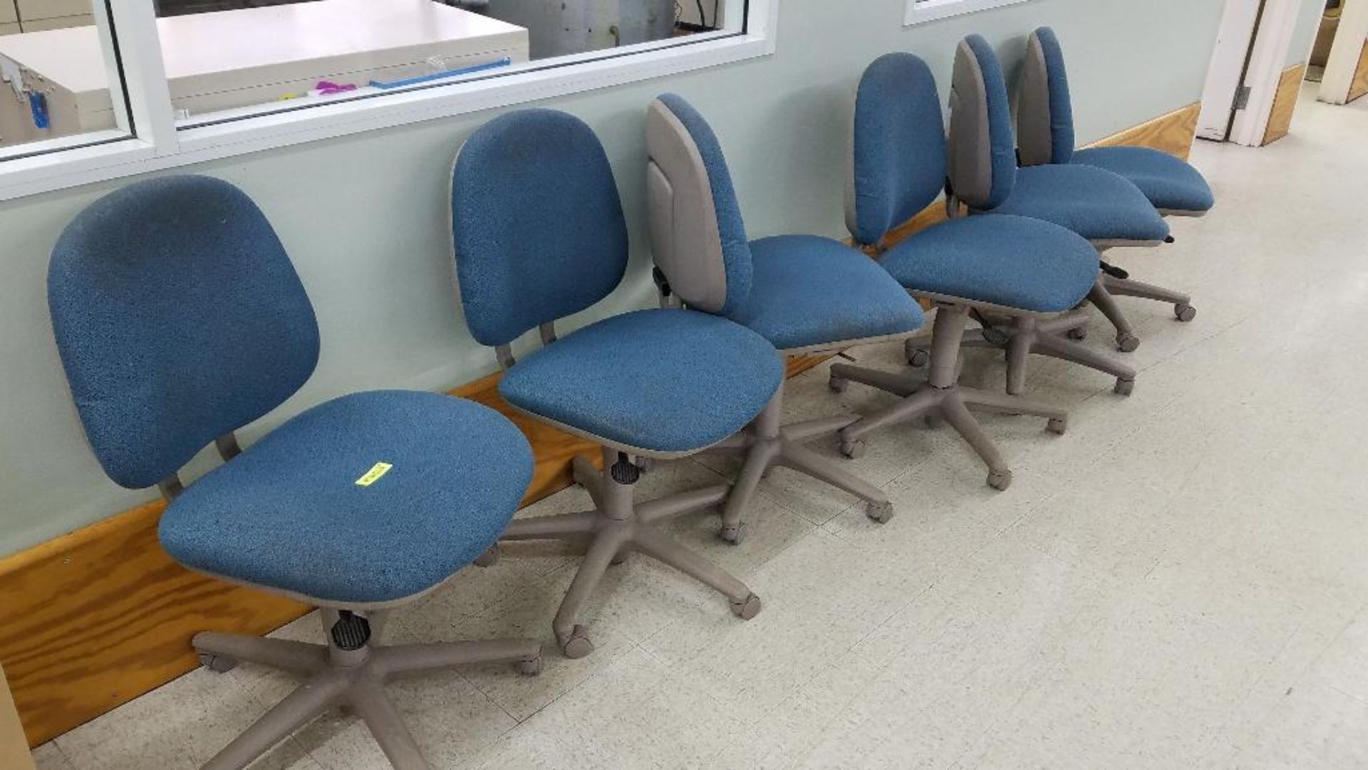 DESCRIPTION: (6) ROLL ABOUT BLUE UPHOLSTERED OFFICE CHAIRS ADDITIONAL INFORMATION: NEED CLEANED LOCA