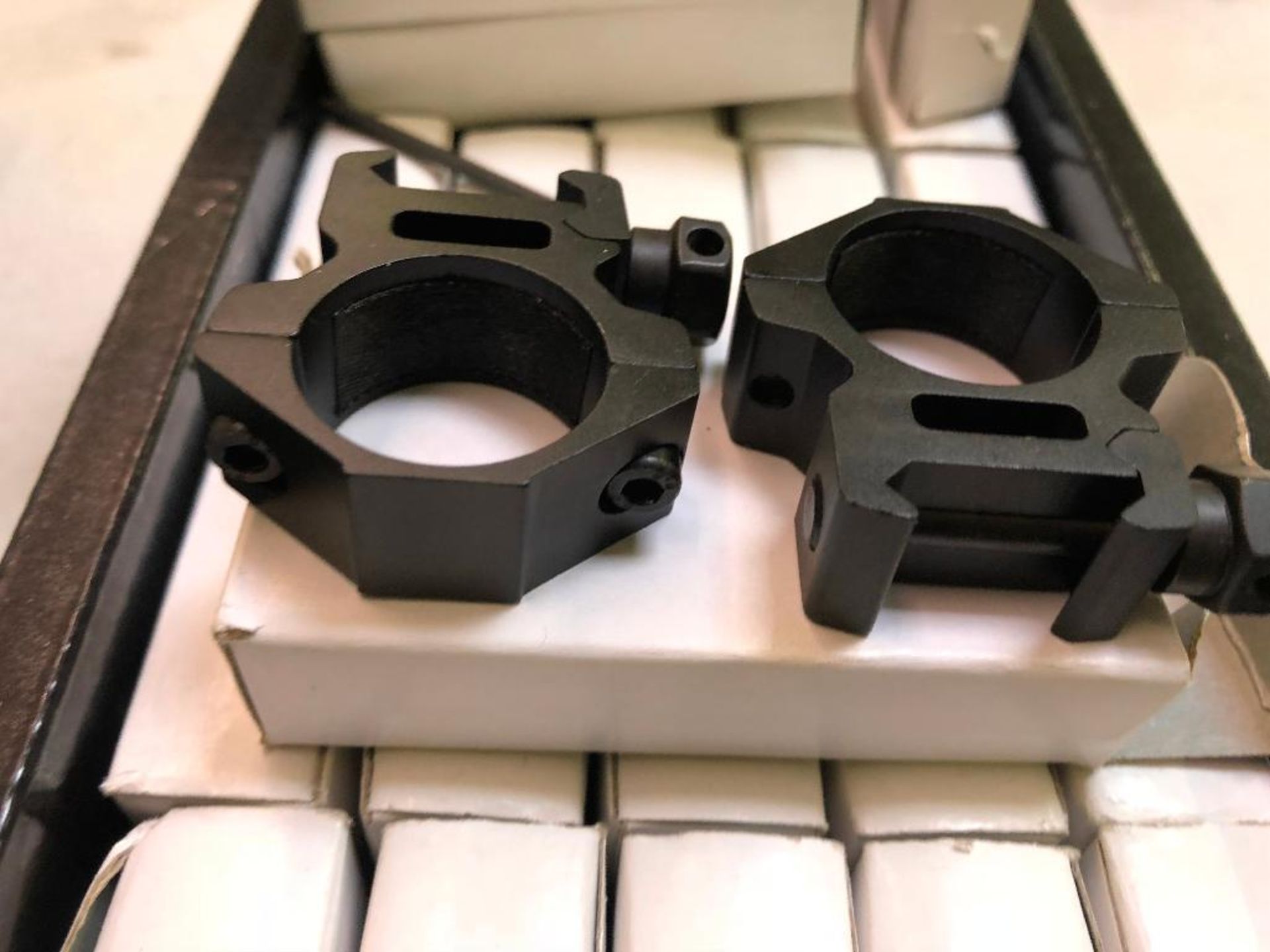 DESCRIPTION: (1) BOX OF ASSORTED SCOPE MOUNTING RINGS. LOCATION: BACK BAY THIS LOT IS: ONE MONEY QTY