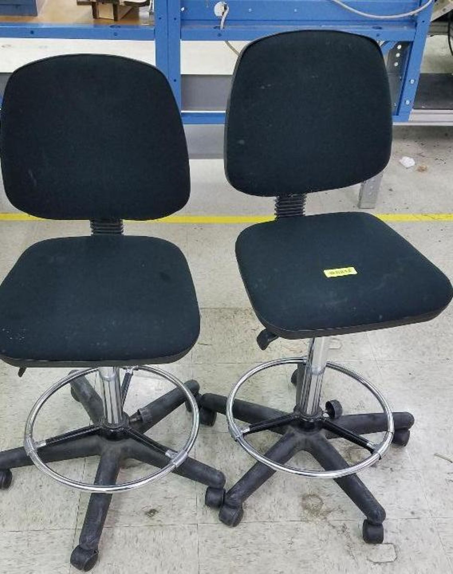 DESCRIPTION: (2) BLACK UPHOLSTERED DRAFTING STOOLS. LOCATION: ASSEMBLY ROOM THIS LOT IS: SOLD BY THE