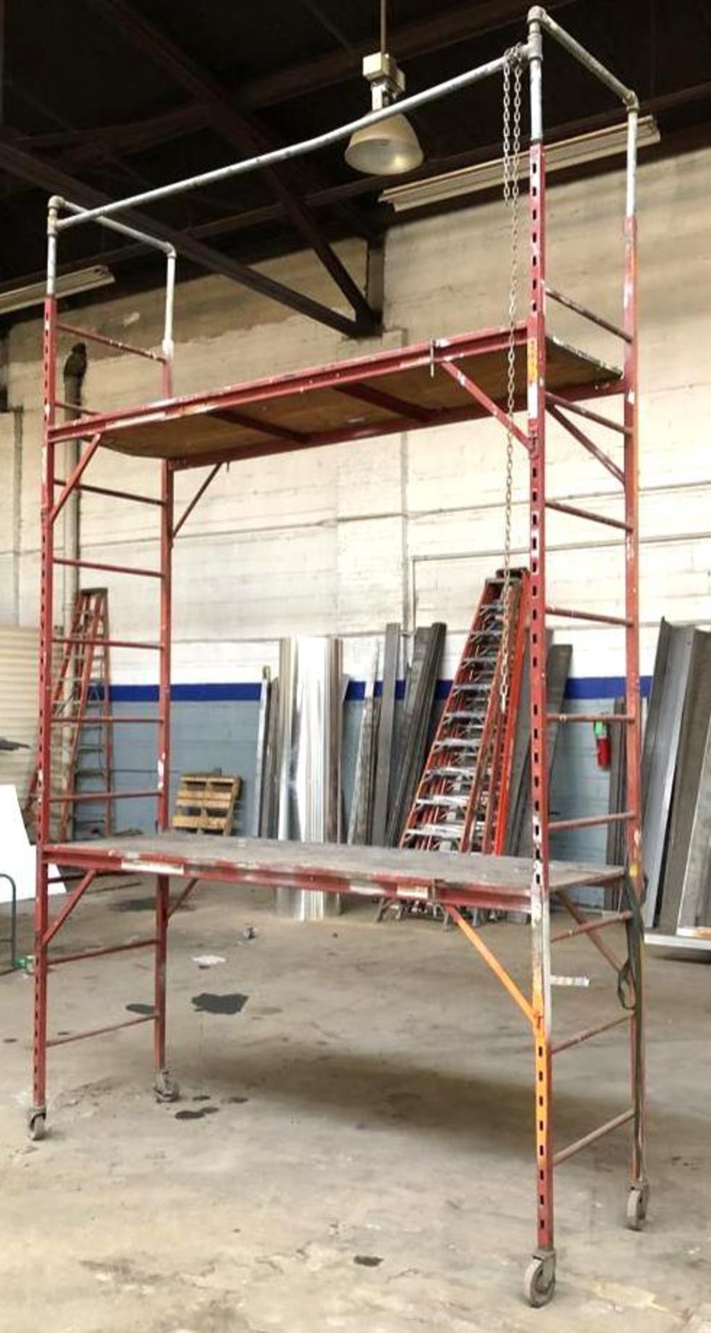 DESCRIPTION: 13 FT. PLATFORM HEIGHT STEEL SCAFFOLD TOWER SIZE: 94" X 29" X 156" LOCATION: WAREHOUSE