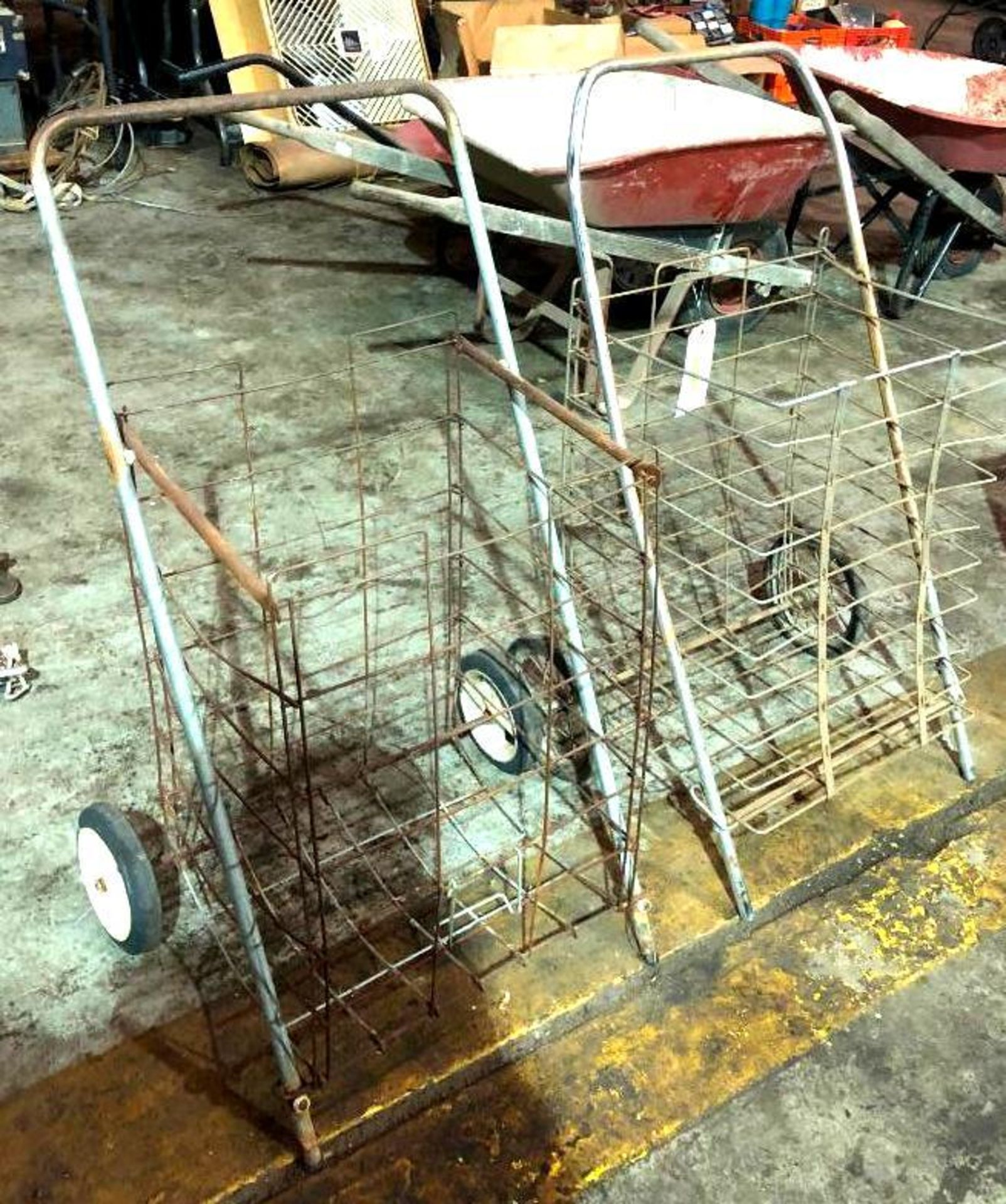 DESCRIPTION (2) COLLAPSIBLE METAL CARTS THIS LOT IS SOLD BY THE PIECE QUANTITY: X BID 2