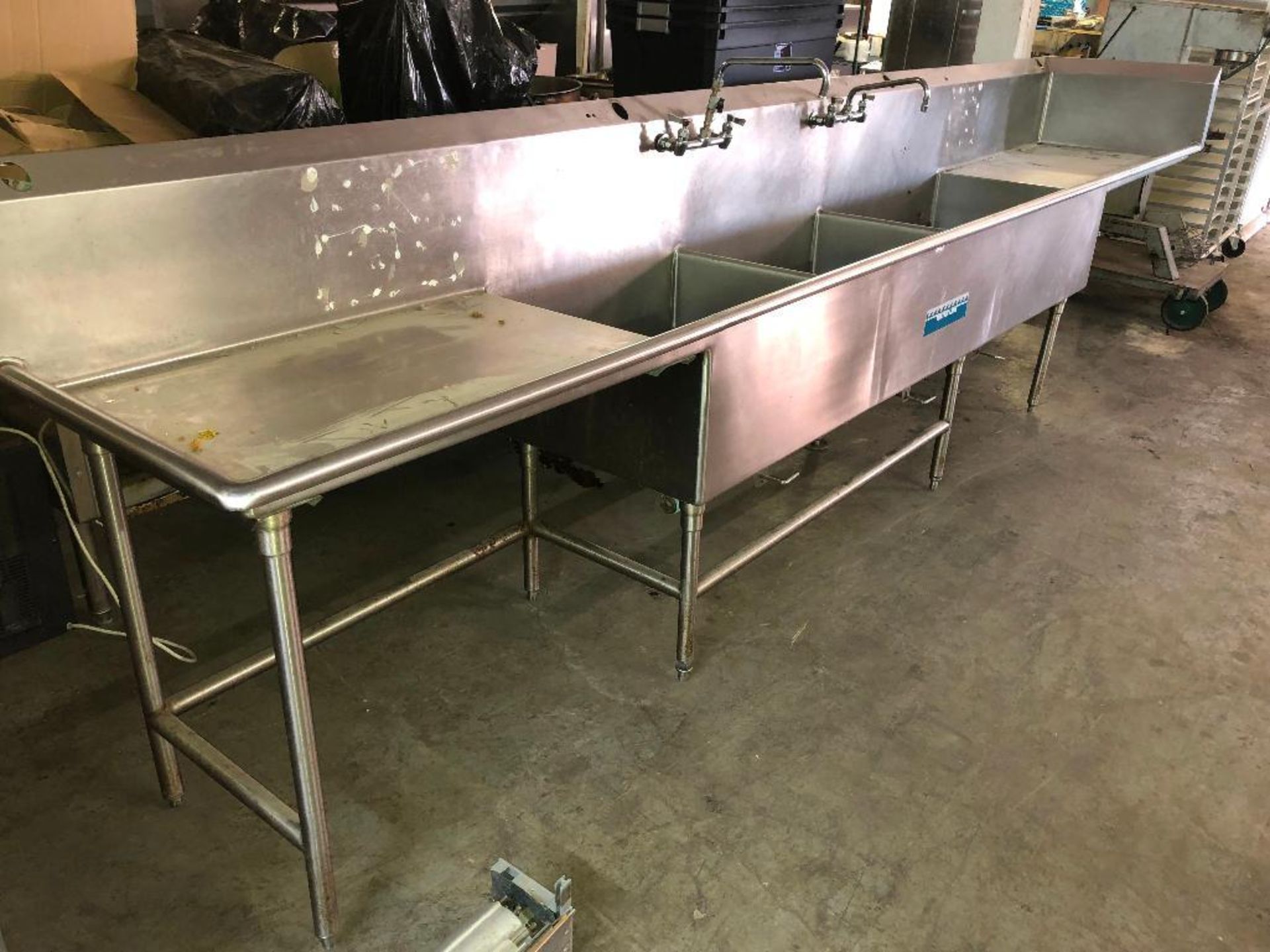 DESCRIPTION: 14' THREE WELL STAINLESS POT SINK W/ LEFT AND RIGHT DRY BOARDS ADDITIONAL INFORMATION: