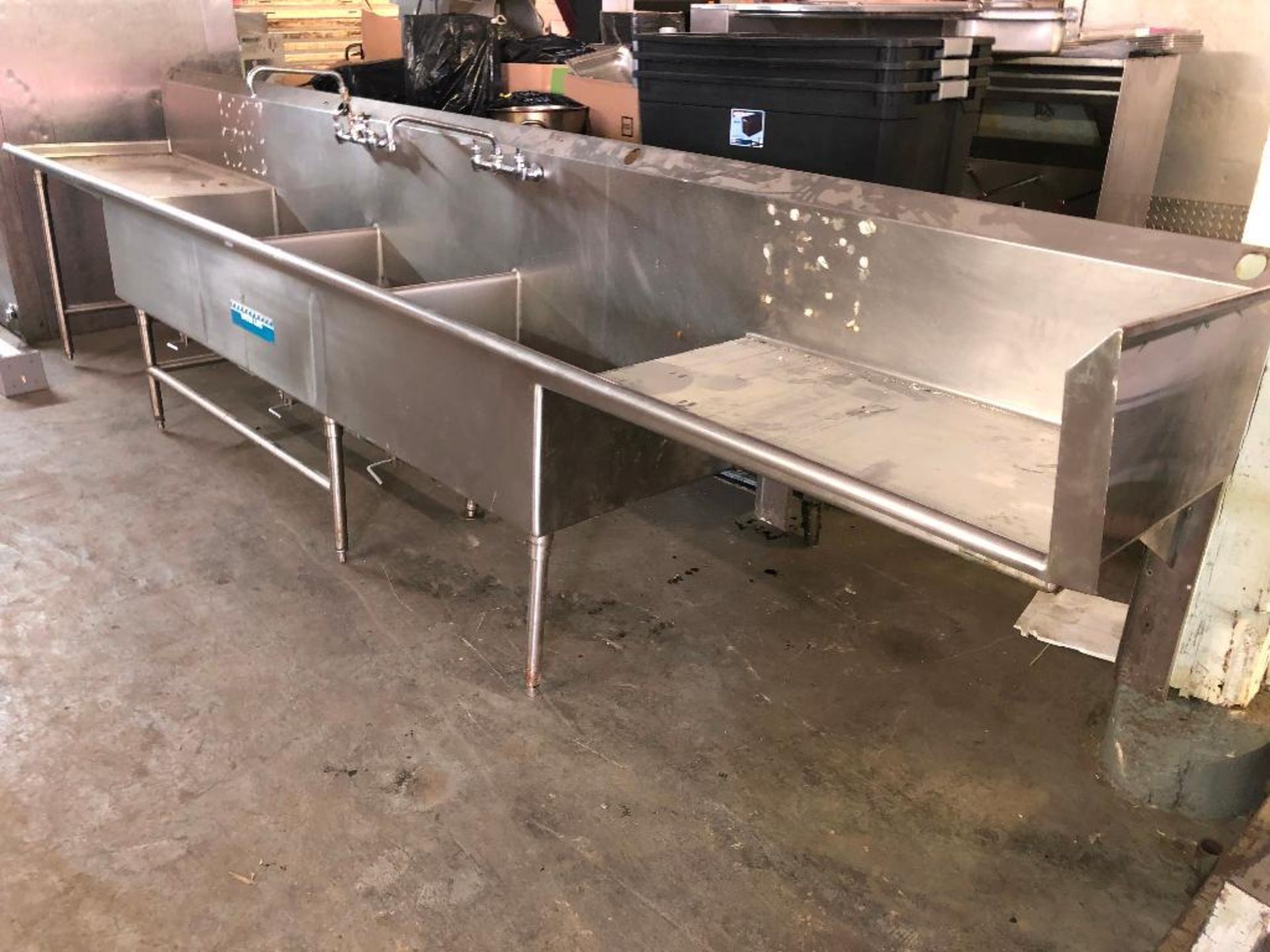 DESCRIPTION: 14' THREE WELL STAINLESS POT SINK W/ LEFT AND RIGHT DRY BOARDS ADDITIONAL INFORMATION: - Image 2 of 3