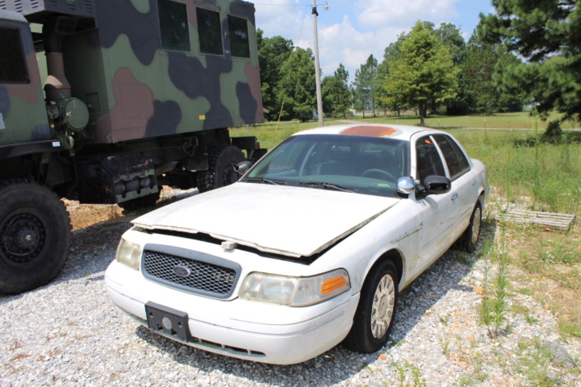 2003 FORD CROWN VIC, NEEDS COIL PACK, 143,582 MILES.