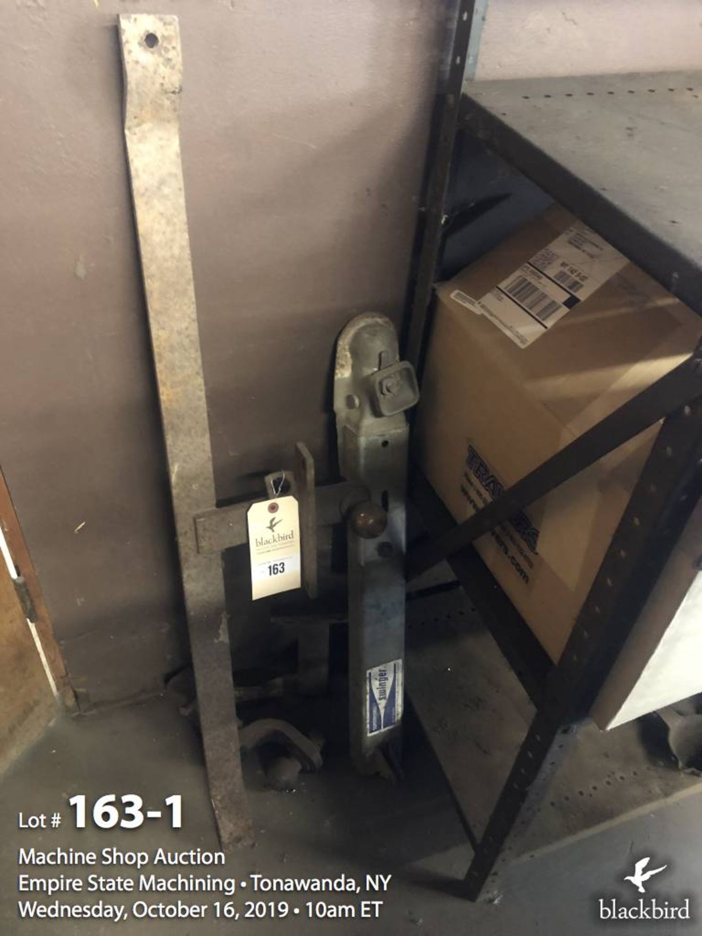 Lot of Trailer hitches against wall