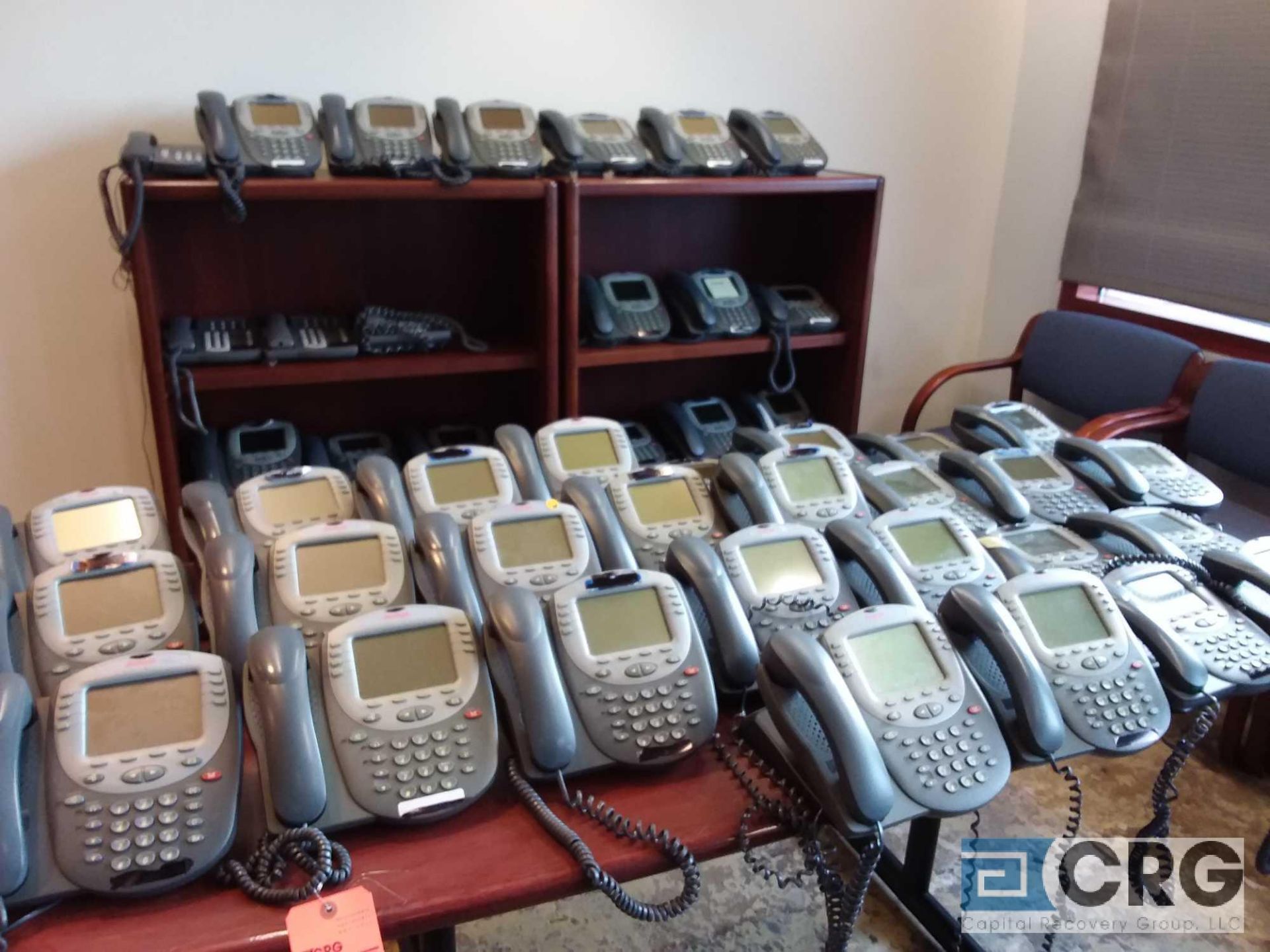 Lot of (100+) Lucent/Avaya 2420D01A-2001 telephone handsets, and components, with contents of