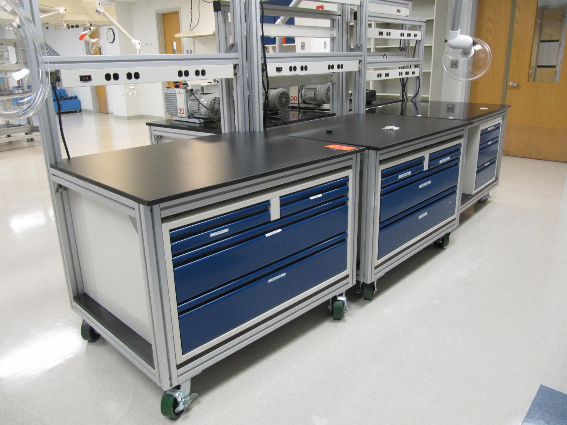 Lot of (5) mobile lab counters, approximate 48" X 36", with drawers and power distribution panels,