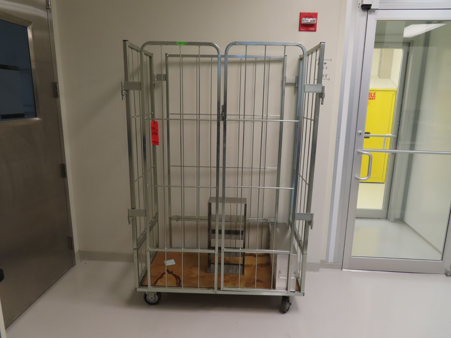 stainless 2 door gage, 46" X 24", with stainless stackable trays, located in building 5, 5th