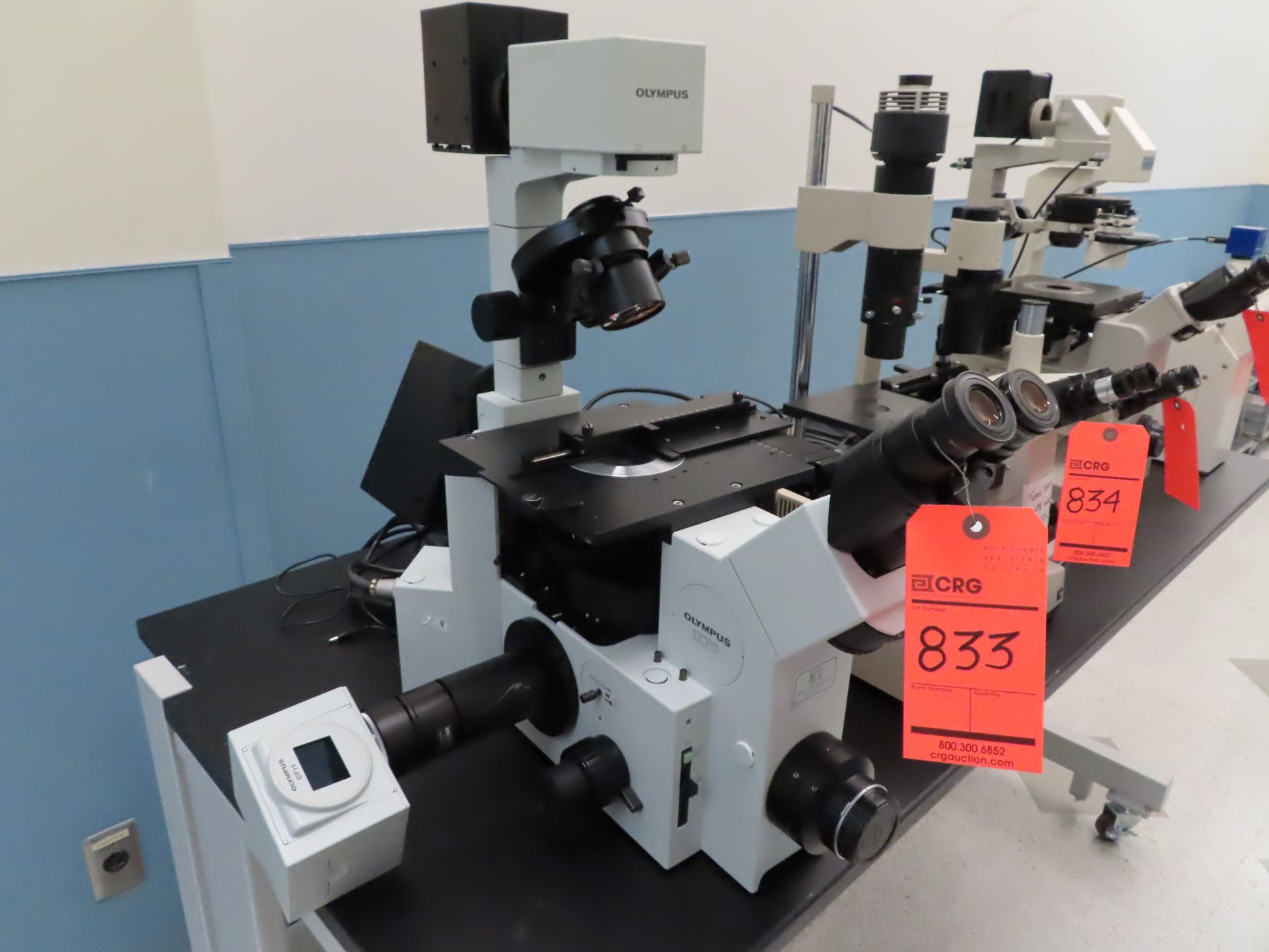 Olympus IX50 inverted system microscope, s/n AX7066, with light source and Olympus DP11, located B