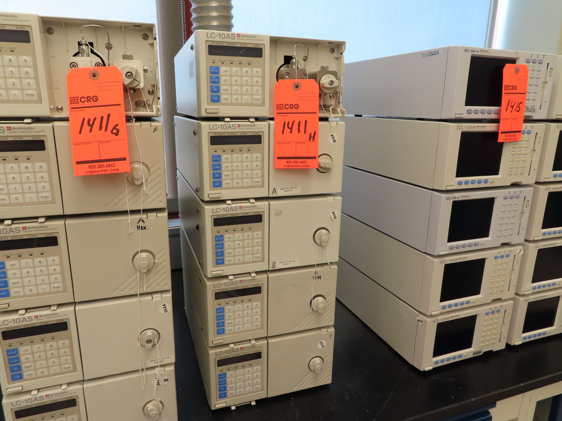 Lot of (5) Shimadzu LC-10AS liquid chromatograph pumps, located in A Wing, 4th floor room 401A