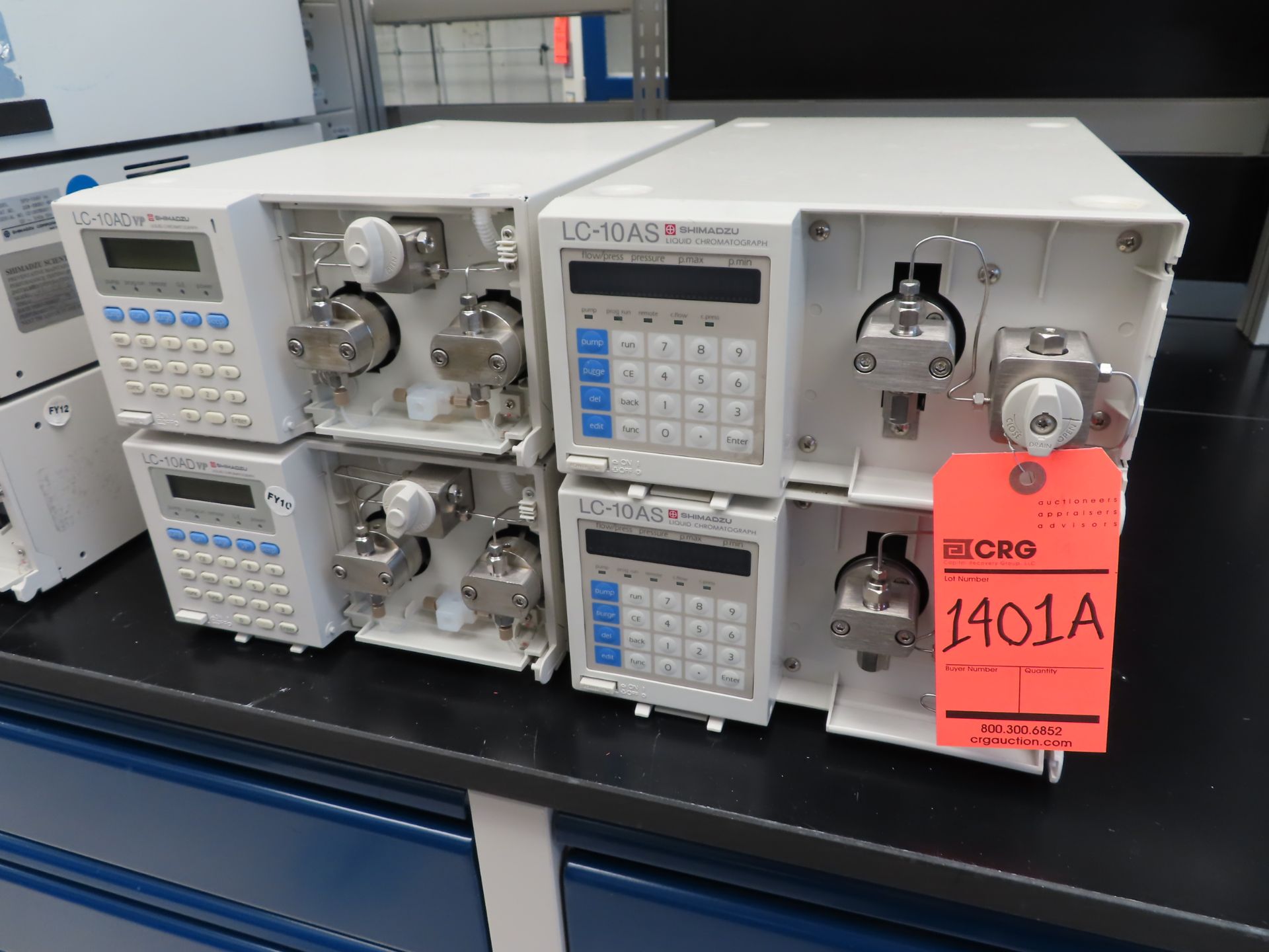 Lot of (4) assorted Shimadzu liquid chromatograph pumps including: (2) LC-10AD VP and (2) LC-10AS,