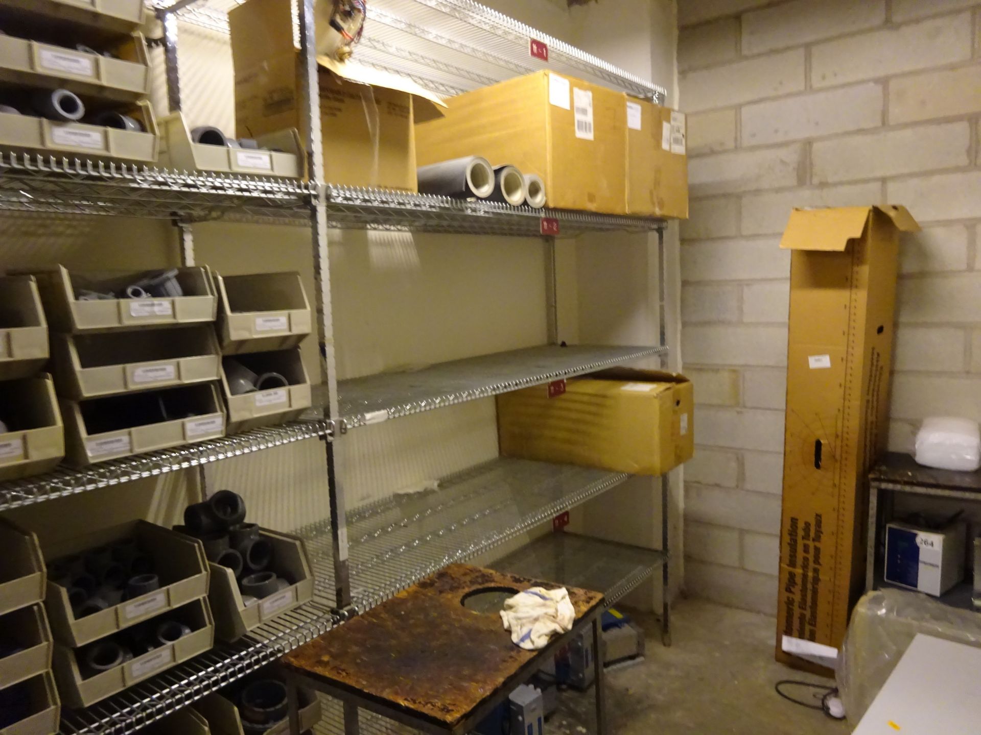 Parts and supplies store room (basement) including pumps, valves, pillow blocks, PVC, surplus