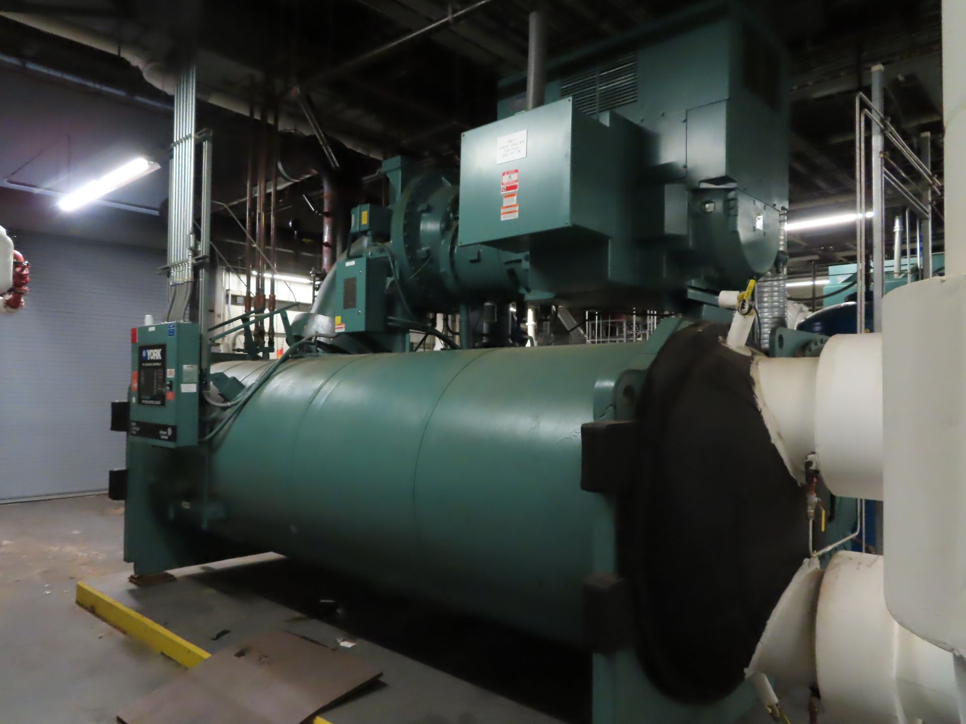 2010 York Max Centrifugal liquid chiller, unit model YKJKHDJ2-DBFS, 1,500 Ton, 1050 HP, refrigerant