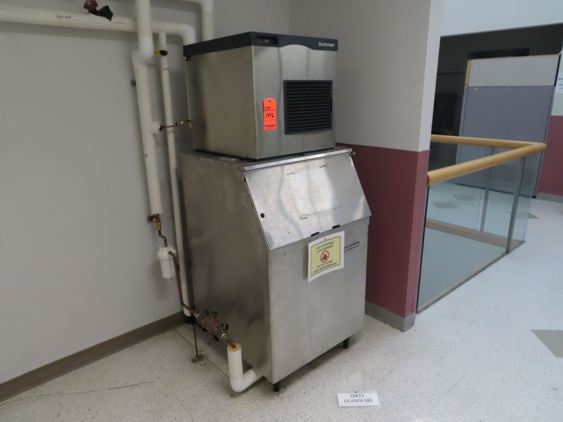 Scotsman F0822A-1A ice maker, s/n 10111320010499, self contained, location in hallway next to lot