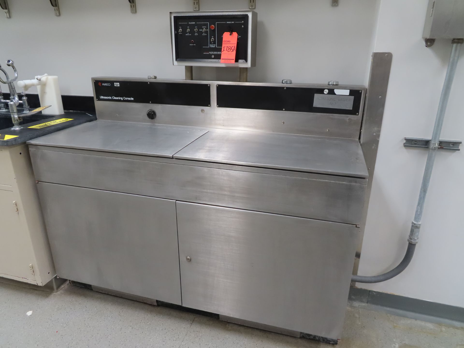 Amsco stainless steel dual tank full immersion Ultrasonic cleaning console, located in B wing, 4th