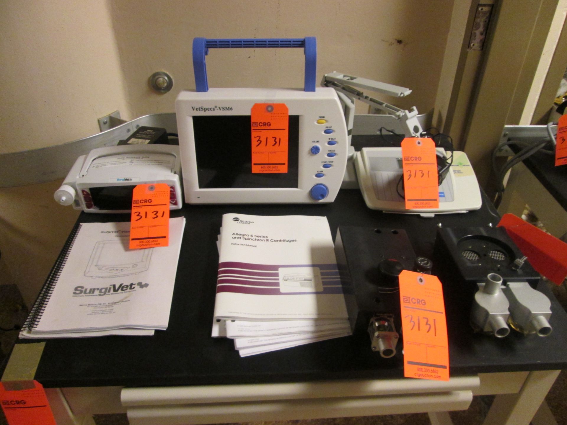 Lot of assorted devices, contents of table including (1) SurgiVet vital signs monitor, (1)