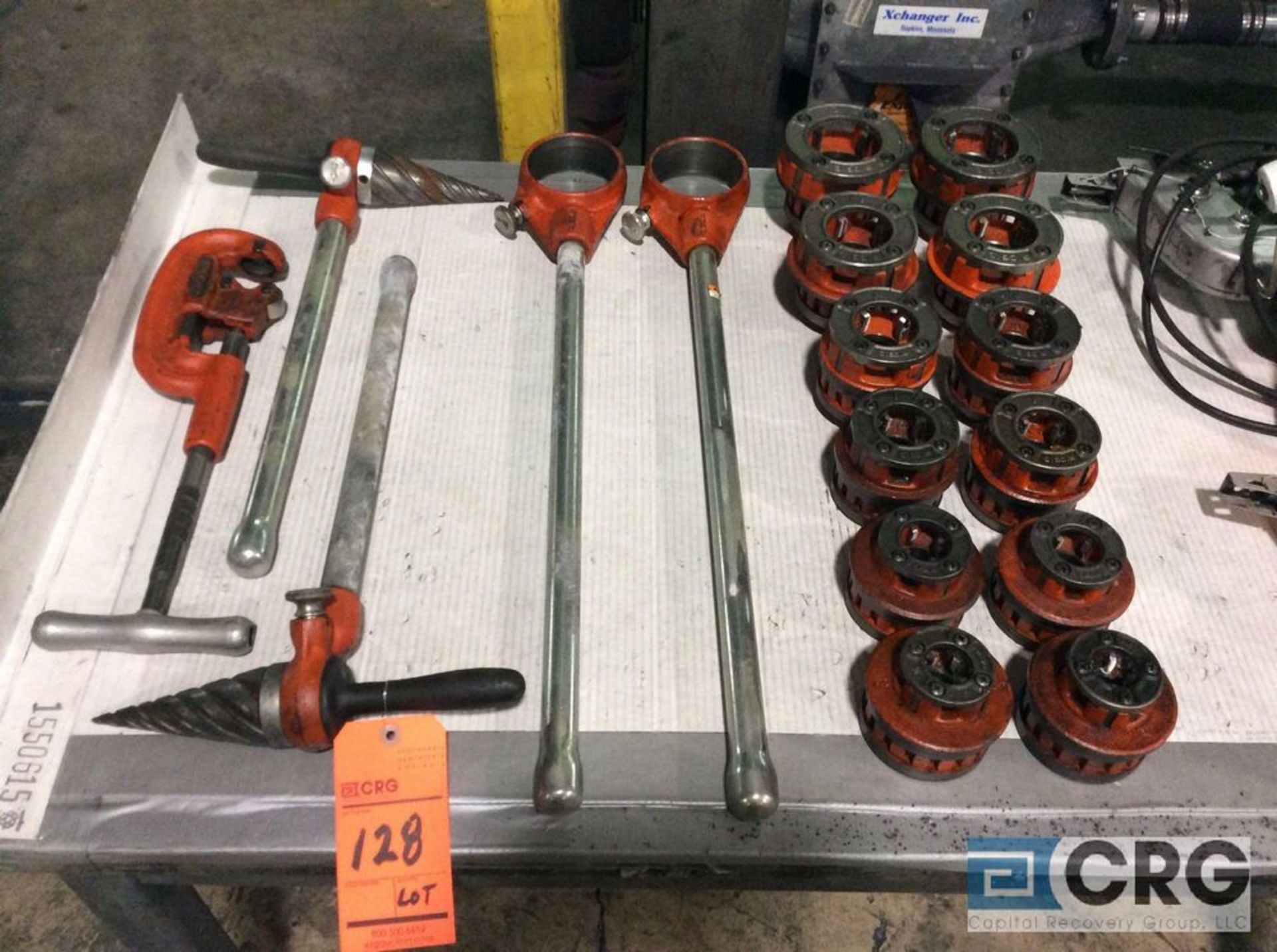 Lot of Ridgid hand operated pipe threadding equipment including (1) cutter, (2) reamers, (2)