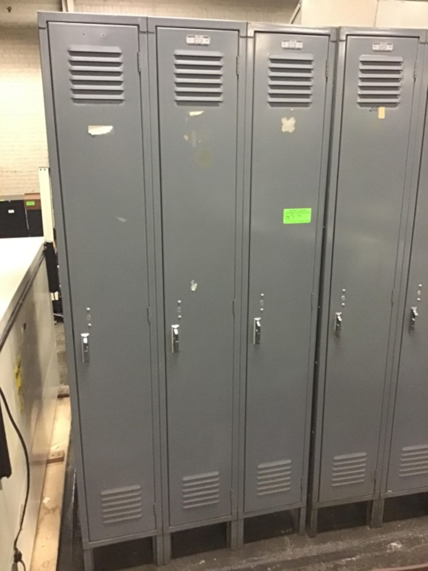 Three sections of single sided lockers
