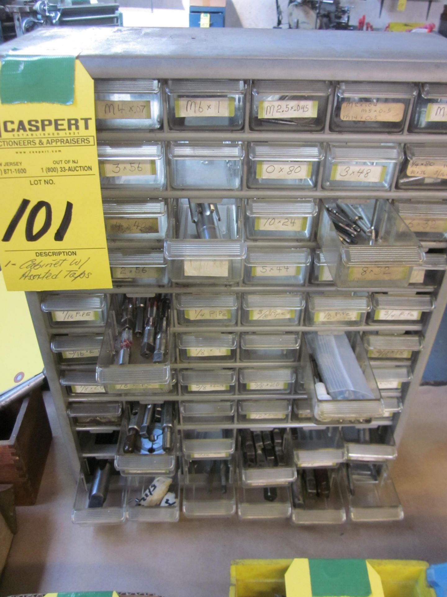 CABINET WITH ASSORTED TAPS