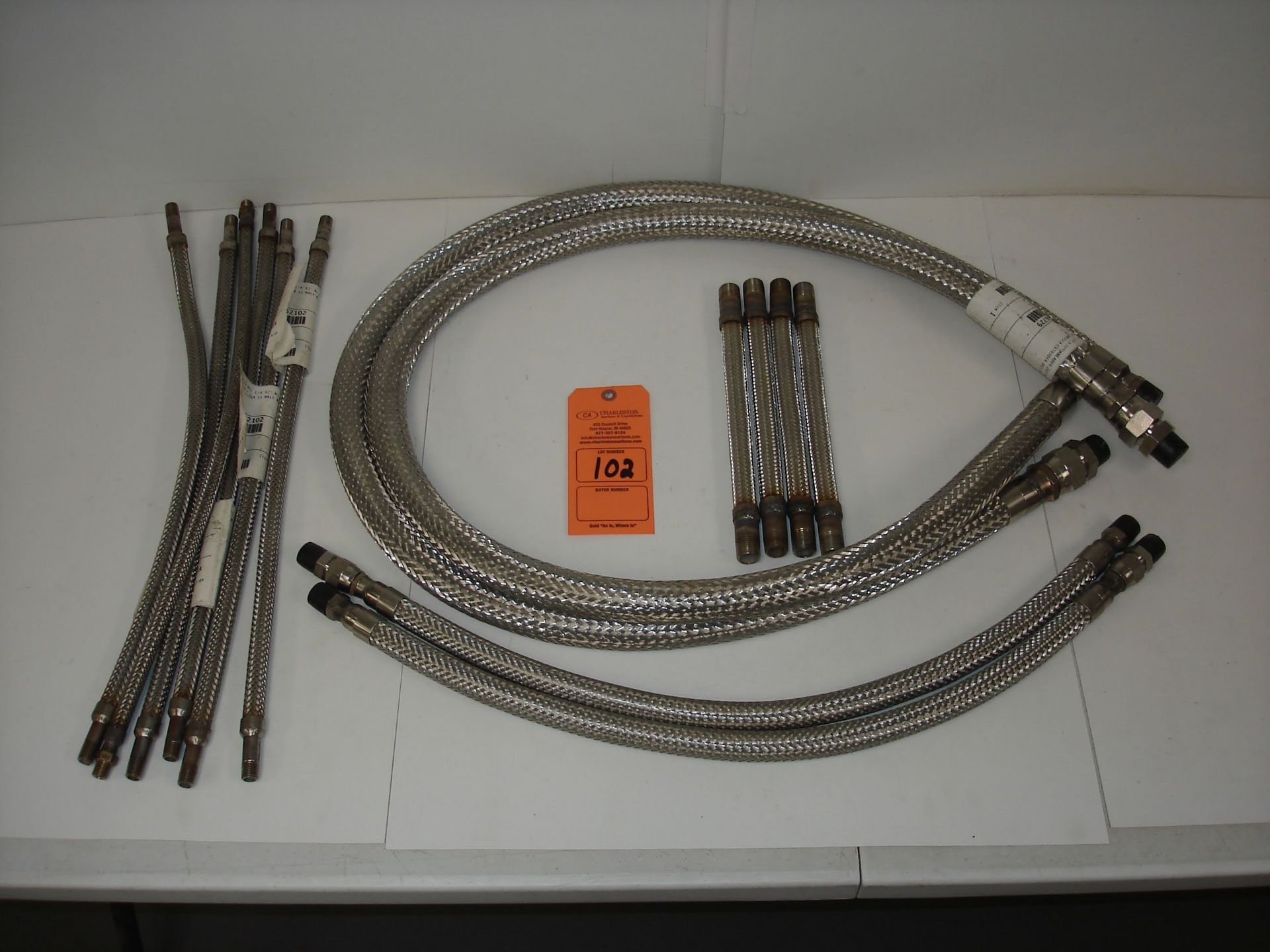 (10+) MISC SIZE BRAIDED FLEX HOSE: 24" BRAIDED FLEX HOSE AND ALL OTHER ITEMS INCLUDED IN PHOTOS!