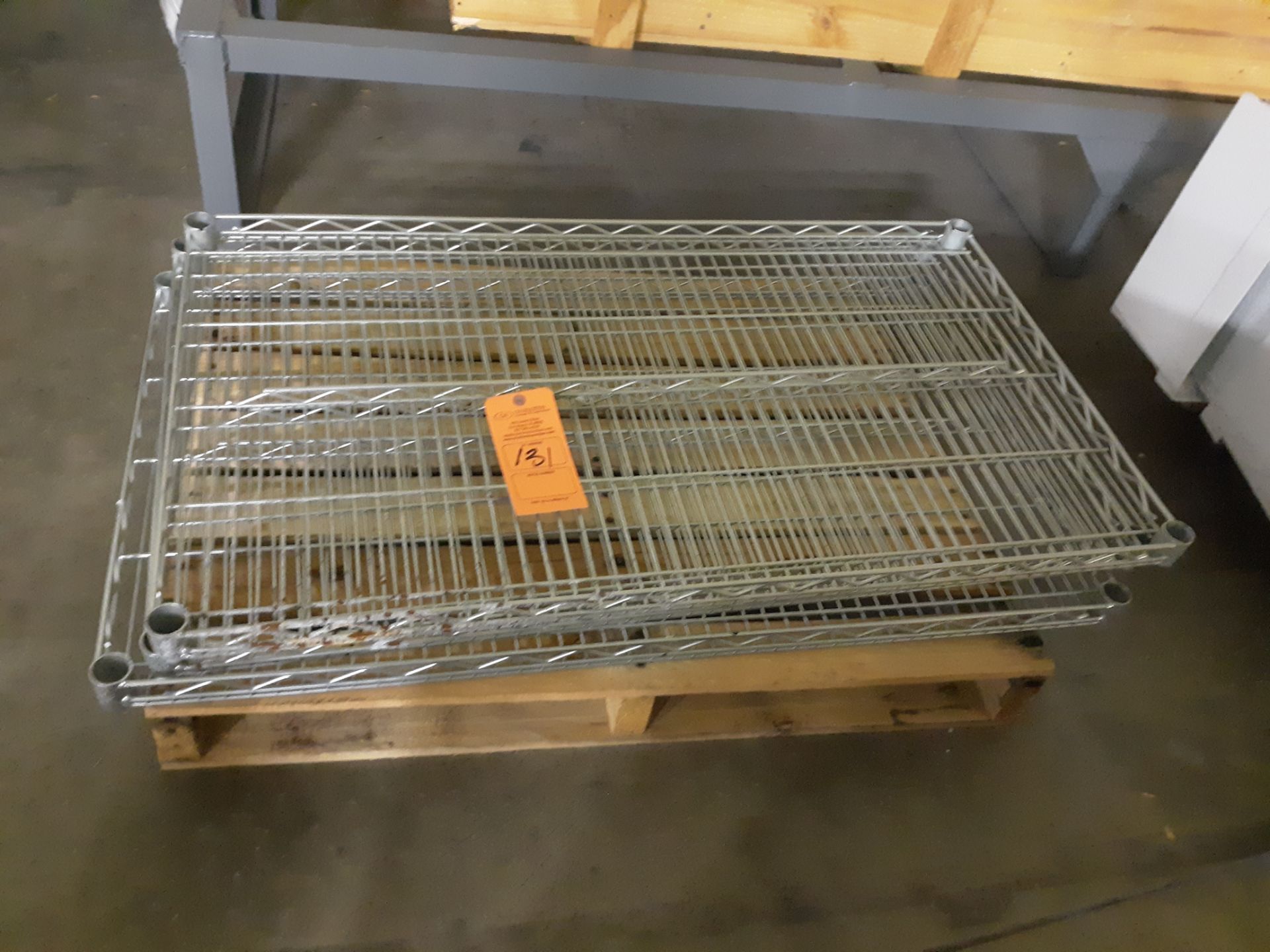 (3) METRORACK SHELVES ONLY (LOCATED AT: 570 S. MAIN STREET, CHURUBUSCO, IN 46723) RIGGING FEE: $10