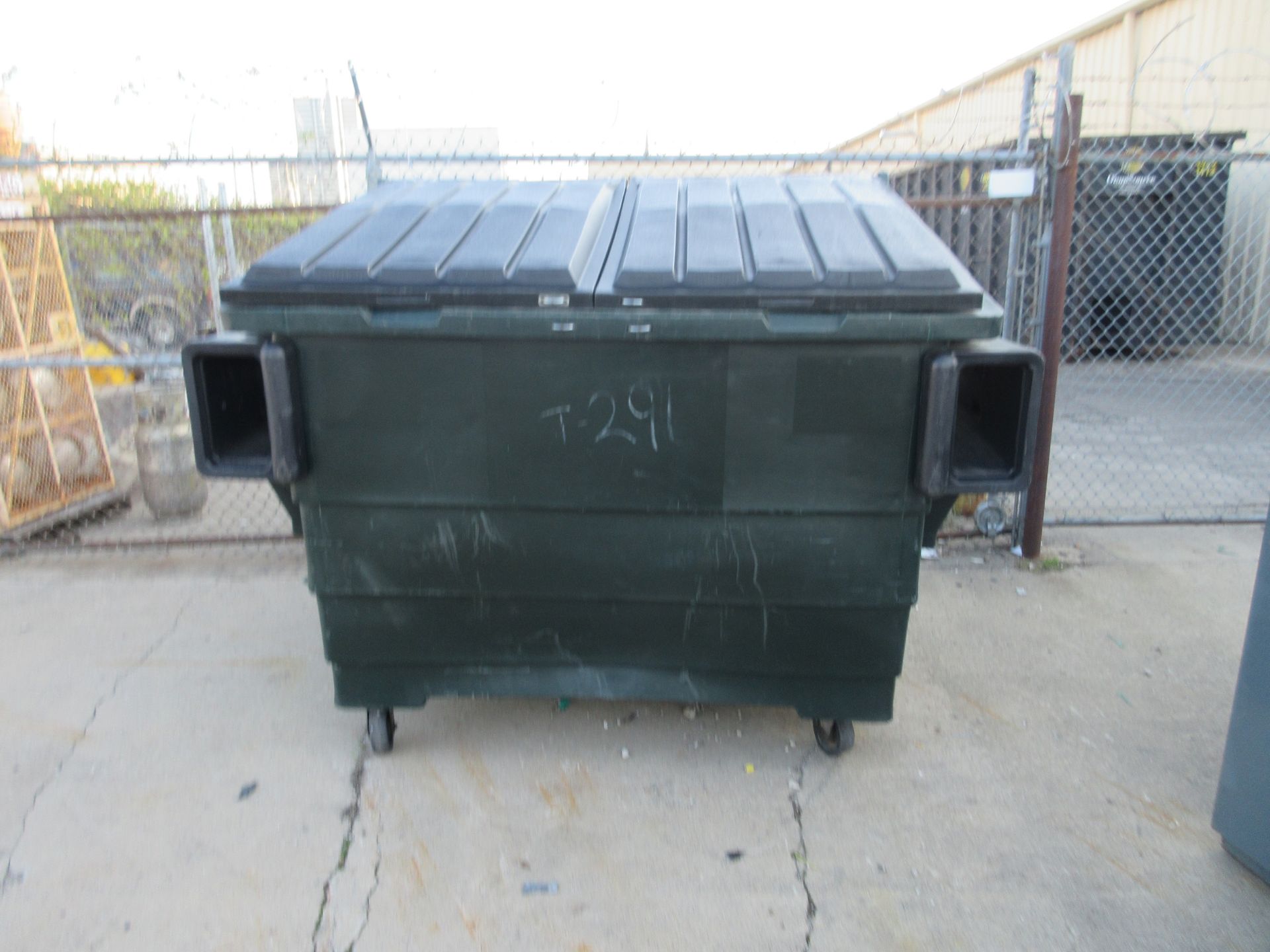 LARGE GREEN DUMPSTER. SOLD AS IS. HANDLING FEES $0-$25. 219 MURRAY STR. FORT WAYNE. IN. 46803