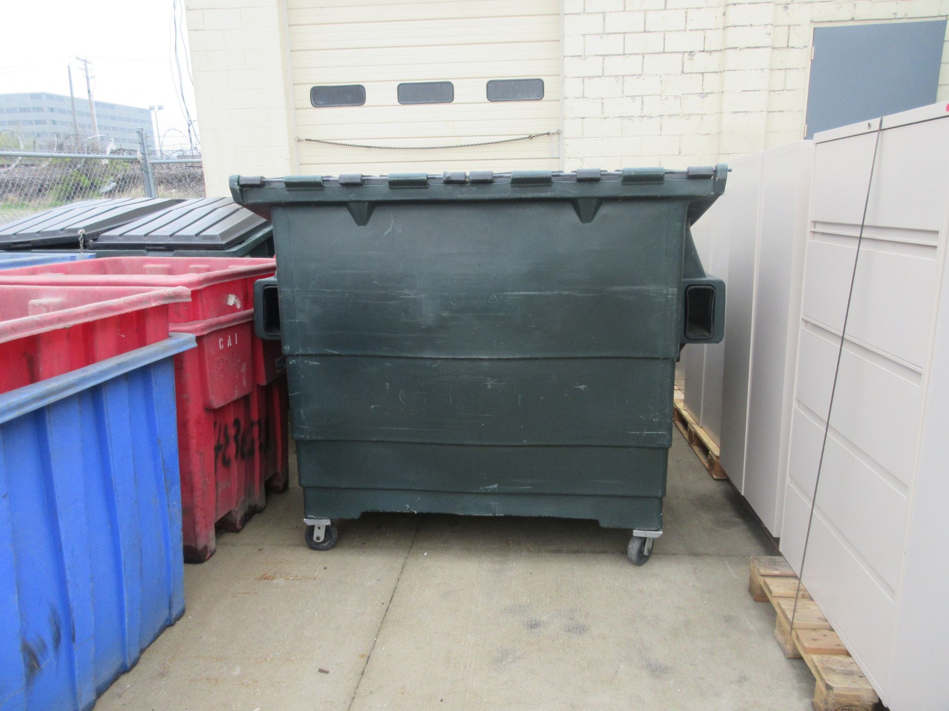 LARGE GREEN DUMPSTER. SOLD AS IS. HANDLING FEES $0-$25. 219 MURRAY STR. FORT WAYNE. IN. 46803 - Image 2 of 3