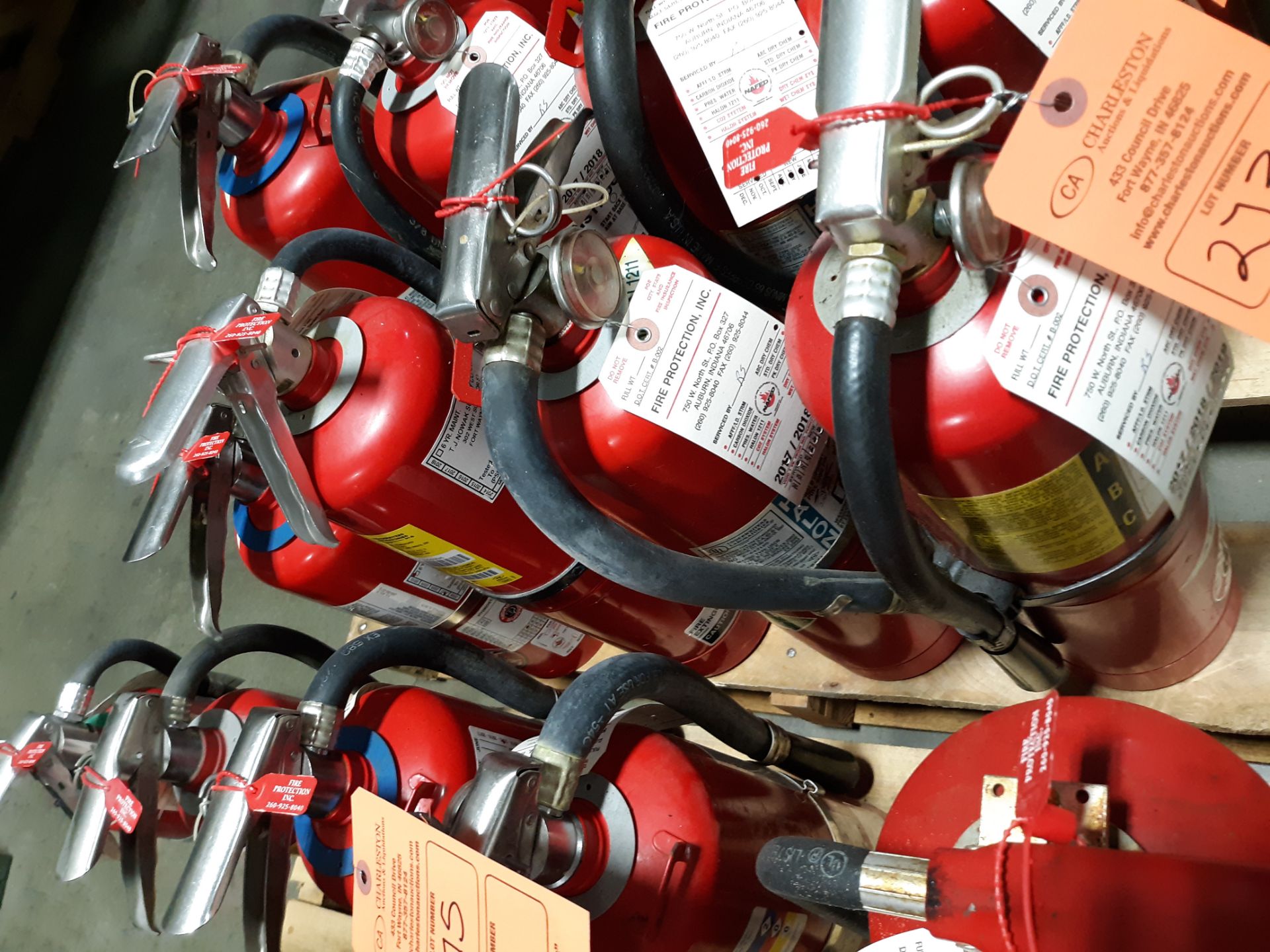 (4) FIRE EXTINGUISHERS (LOCATED AT: 570 S. MAIN STREET, CHURUBUSCO, IN 46723) RIGGING FEE: $10