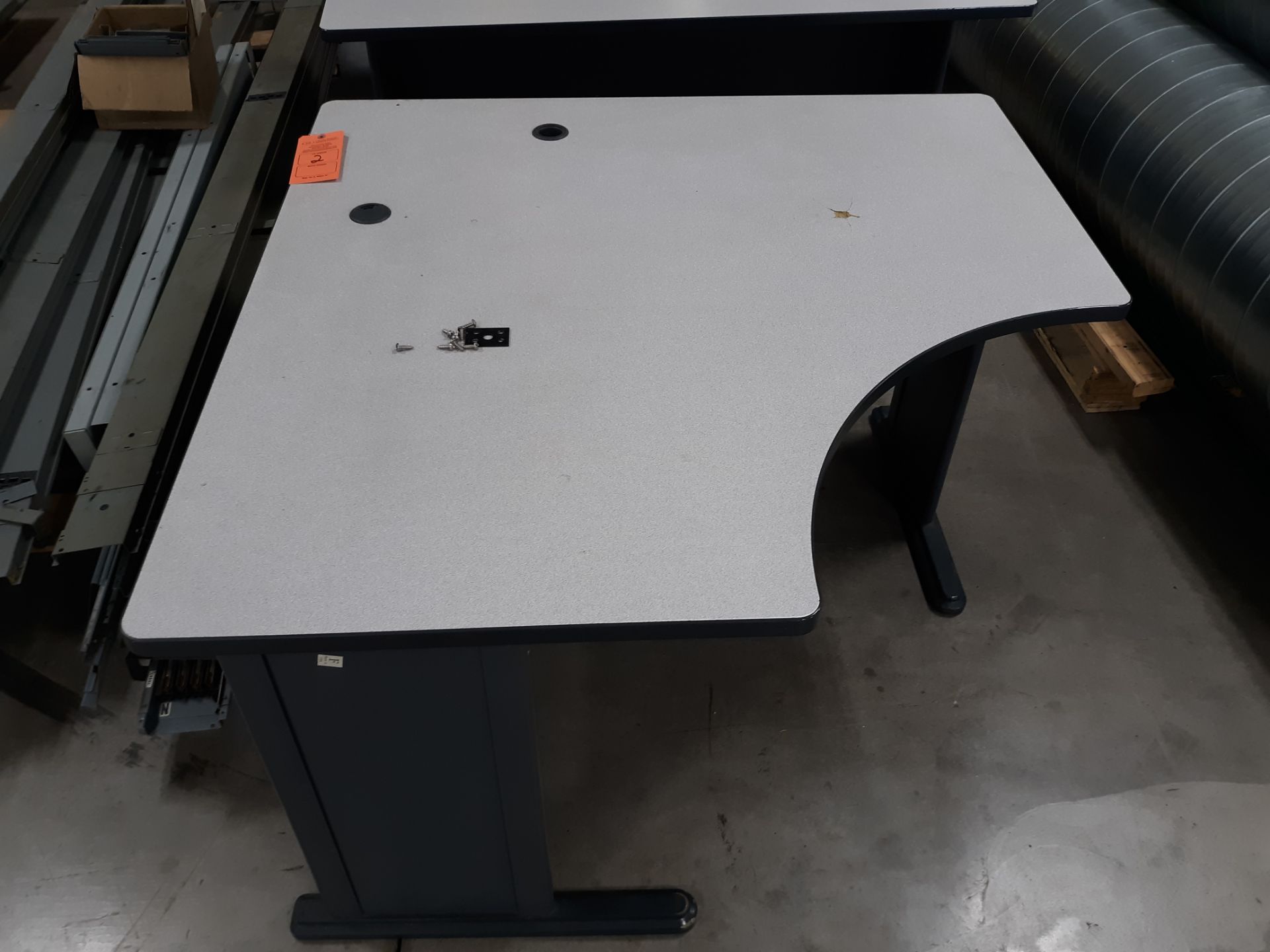 L-SHAPED DESK; RIGGING FEE: $10