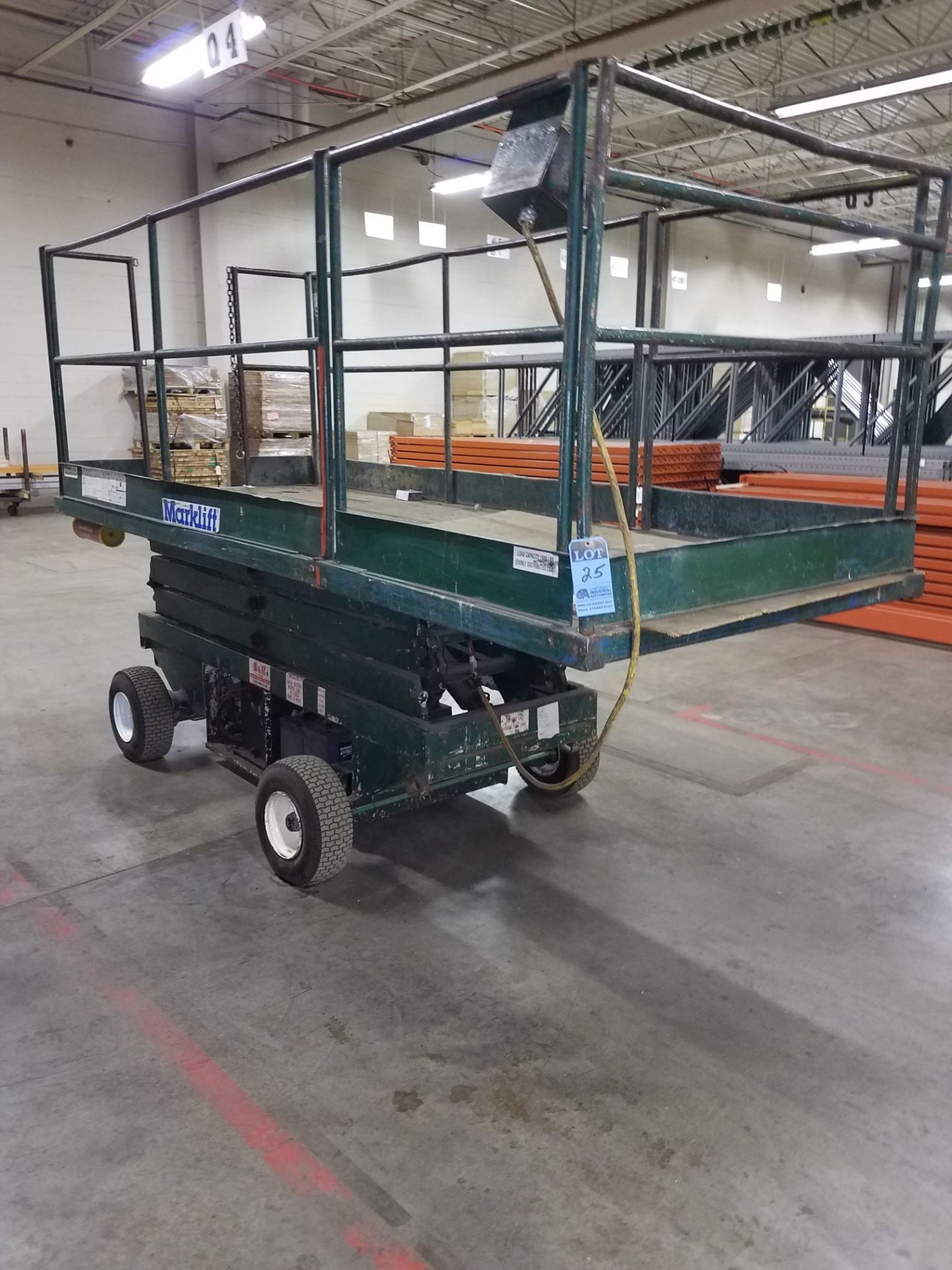 MARKLIFT ELECTRIC SCISSOR LIFT, 54" WIDE X 134" LONG WORK PLATFORM, 168" LIFT HEIGHT, 1,000 LB.