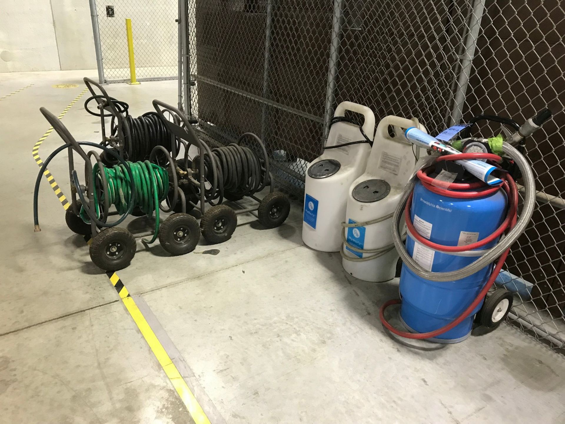 HYDROFILL AND PHILADELPHIA SCIENTIFIC BATTERY WATERING CARTS AND (3) GARDEN HOSE REELS