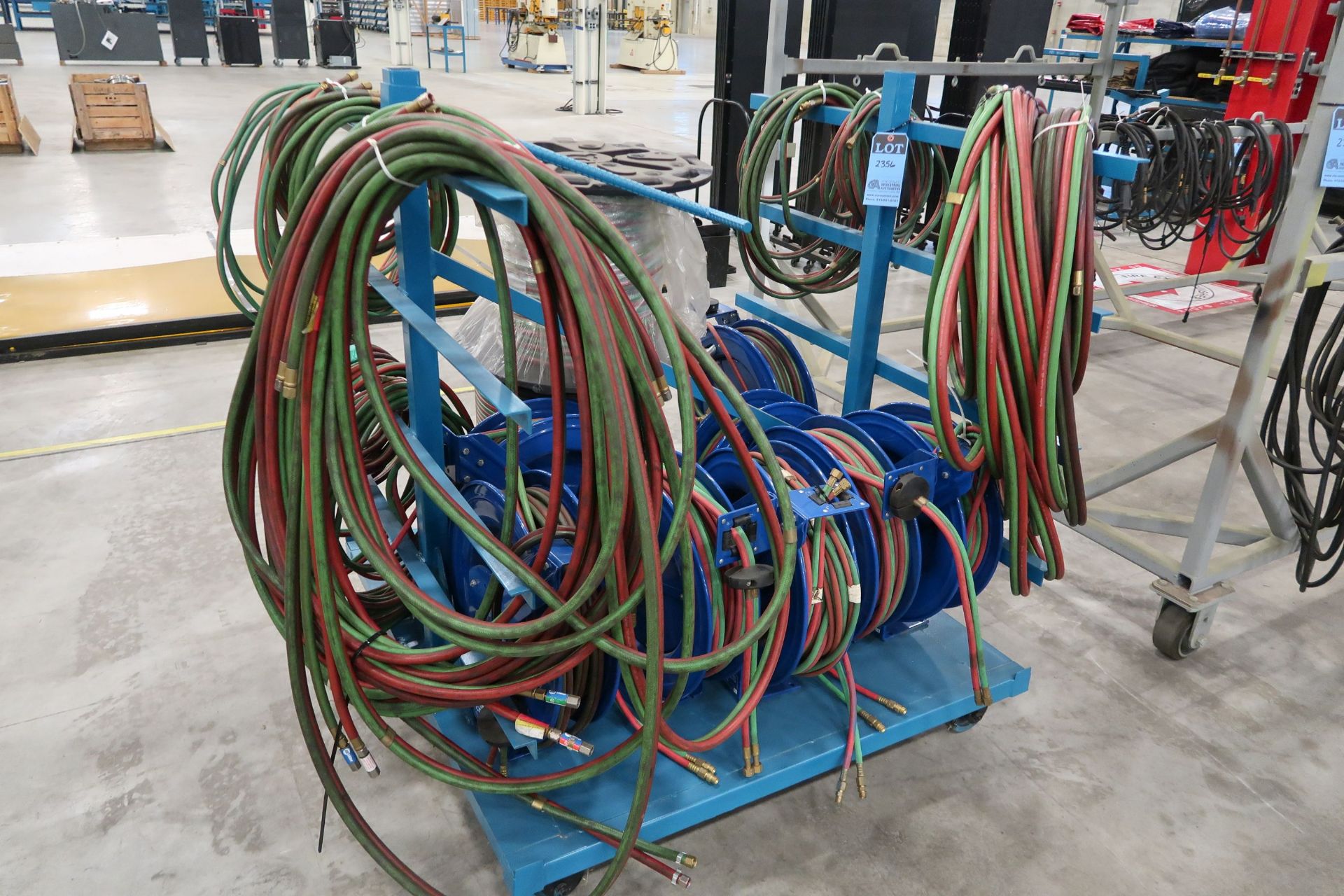 (LOT) HOSE REELS AND HOSES WITH CART