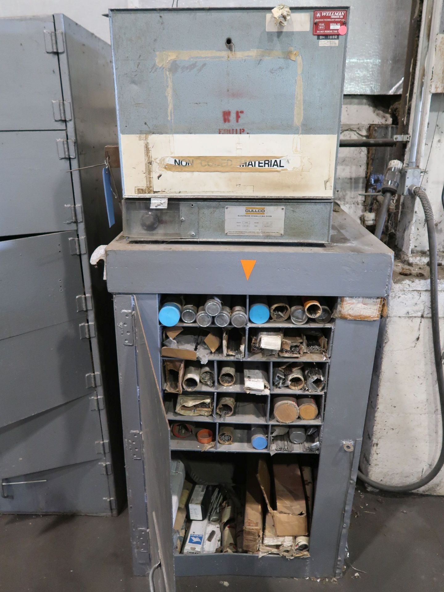 (LOT) GULLCO ROD OVEN W/ CABINET OF WELD ROD